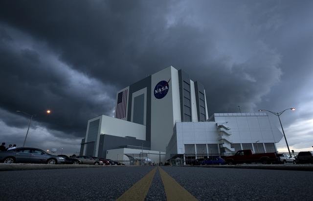 NASA image: Storm Clouds Roll In Over The Vehicle Assembly Building