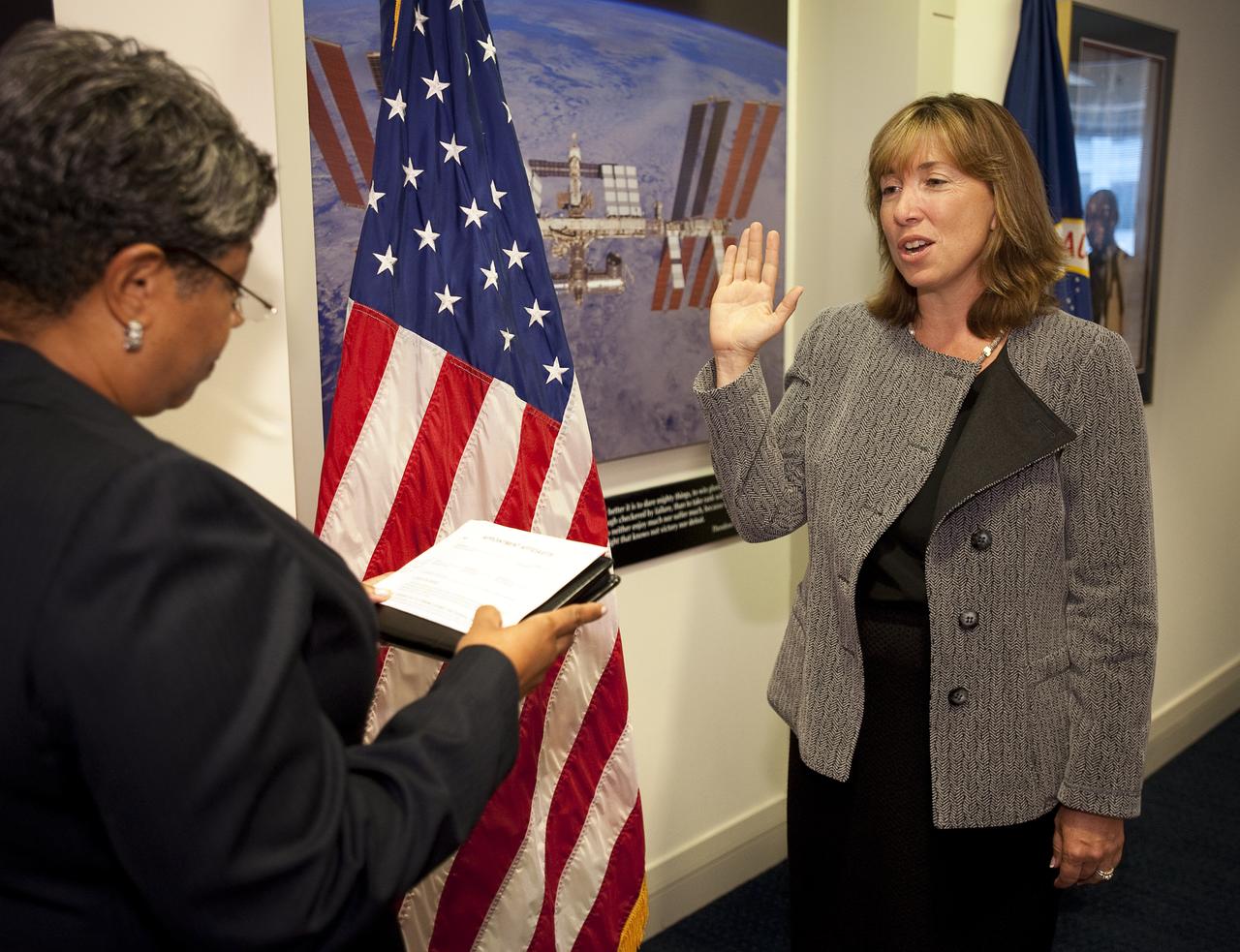 Lori B. Garver is sworn in as Deputy Administrator of the National Aeronautics and Space Administration at NASA Headquarters, Friday, July 17, 2009 in Washington. Photo Credit: (NASA/Bill Ingalls)