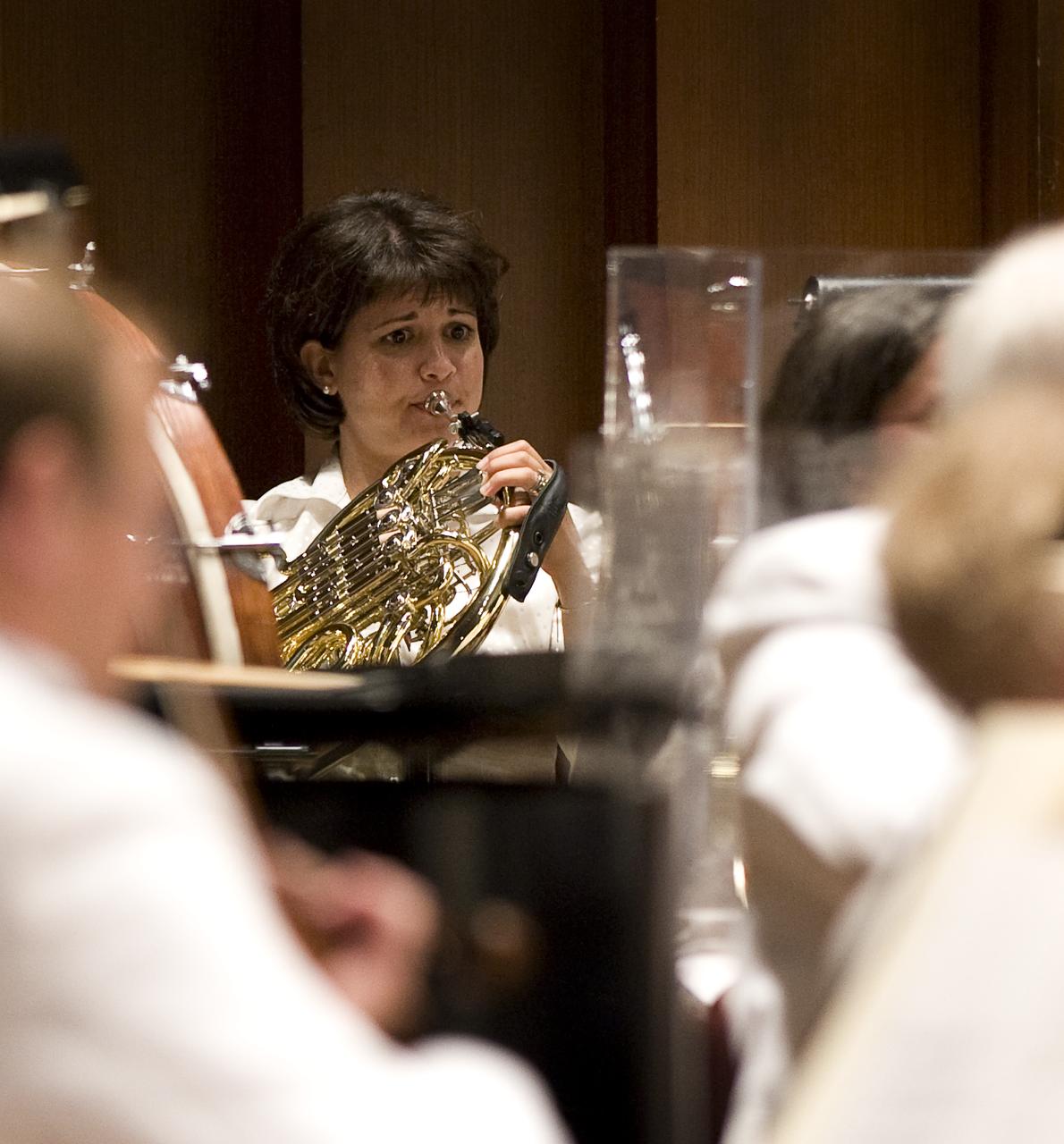 Members of the National Symphony Orchestra, under Conductor Emil de Cou, perform during the "Salute to Apollo" ceremony at the Kennedy Center for the Performing Arts, Saturday, July 18, 2009 in Washington. The event was part of NASA's week long celebration of the Apollo 40th Anniversary. Photo Credit: (NASA/Bill Ingalls)