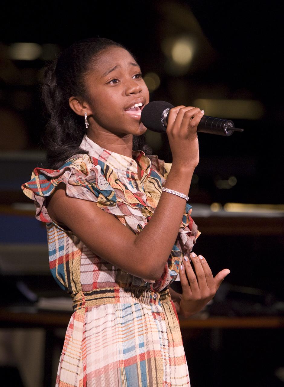 12 year old singer Jamia Nash performs during the "Salute to Apollo" ceremony at the Kennedy Center for the Performing Arts, Saturday, July 18, 2009 in Washington. The event was part of NASA's week long celebration of the Apollo 40th Anniversary. Photo Credit: (NASA/Bill Ingalls)