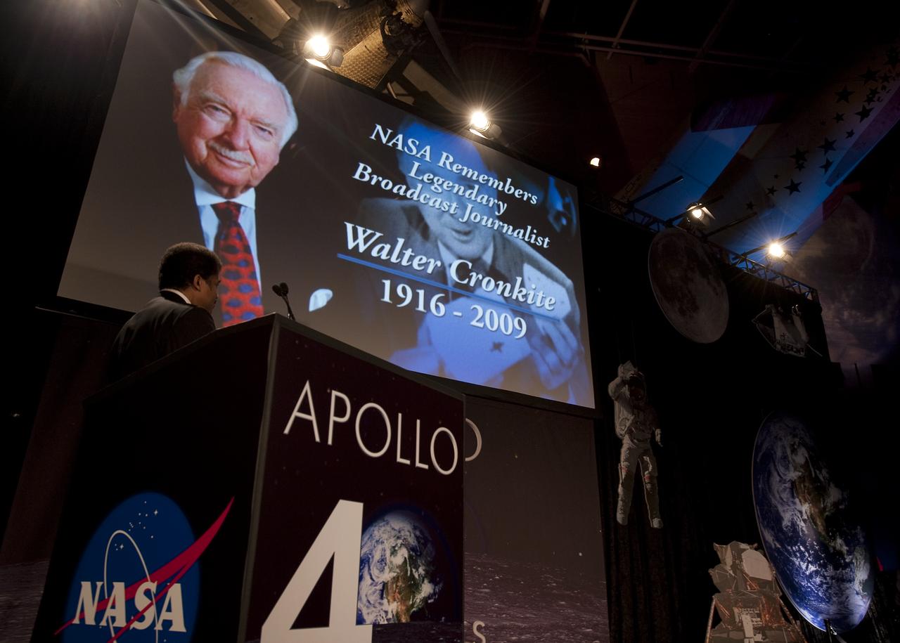Director of the Hayden Planetarium Neil deGrasse Tyson watches as a video is played recognizing journalist Walter Cronkite during the Apollo 40th anniversary celebration held at the National Air and Space Museum, Monday, July 20, 2009 in Washington. Photo Credit: (NASA/Bill Ingalls)