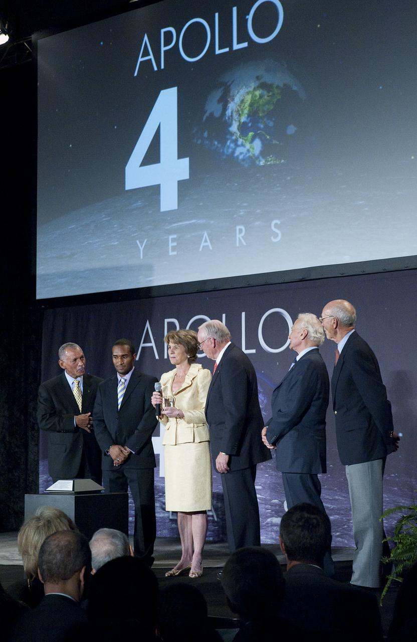 From left, NASA Administrator Charles Bolden, Rice University Electrical and Engineering Student Max Paul, Former Maryland Lieutenant Governor and niece of President John F. Kennedy, Kathleen Kennedy Townsend, Apollo 11 Astronauts, Neil Armstrong, Buzz Aldrin and Michael Collins all pose for a photograph in front of the NASA Ambassador of Exploration Award given posthumously to President John F. Kennedy and accepted on behalf of the Kennedy family by Townsend at the Apollo 40th anniversary celebration held at the National Air and Space Museum, Monday, July 20, 2009 in Washington.  The award will be on permanent display at Rice University at the request of the Kennedy family.  Photo Credit: (NASA/Carla Cioffi)