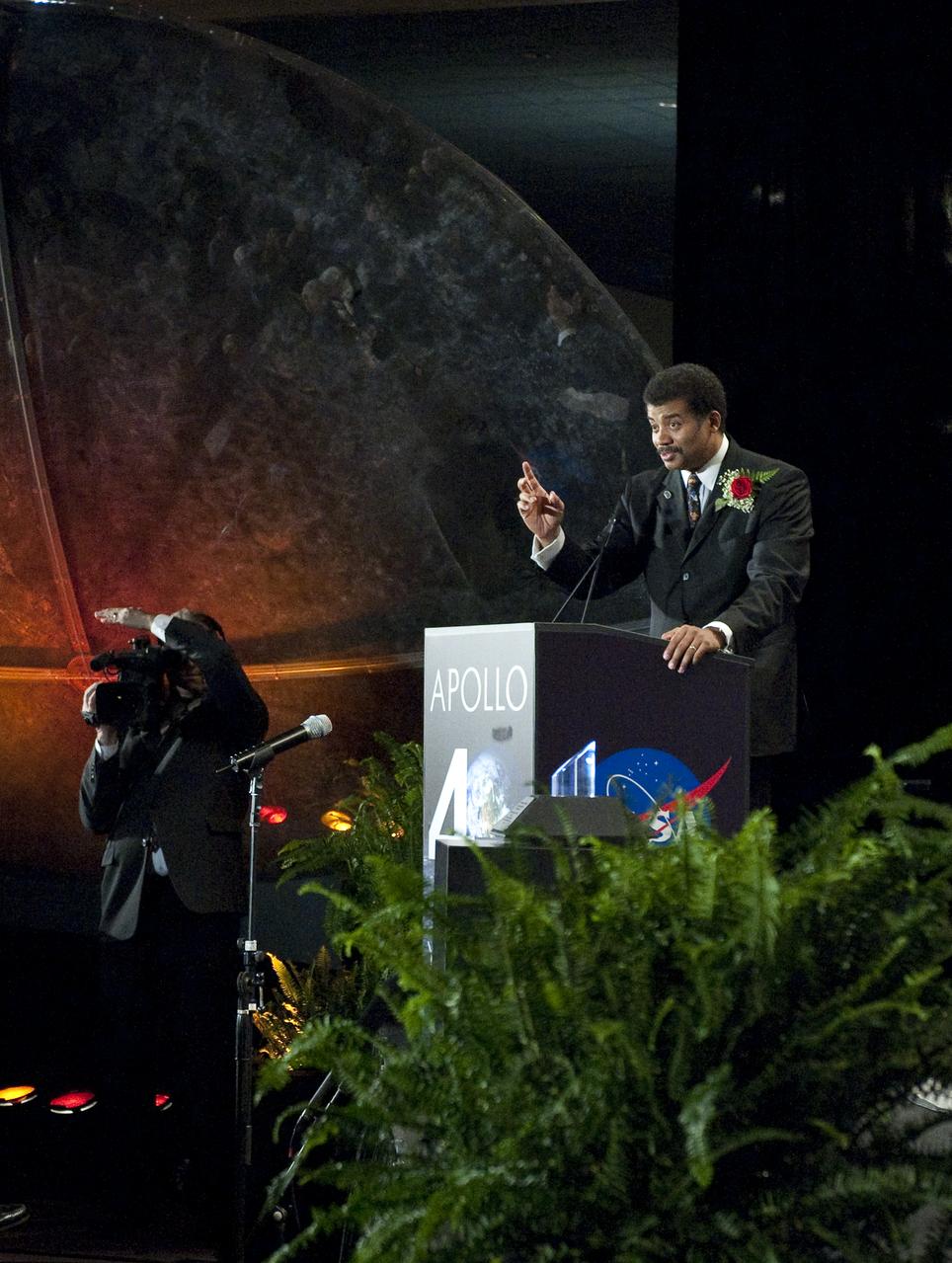 Director of the Hayden Planetarium Neil deGrasse Tyson speaks as host of the Apollo 40th anniversary celebration held at the National Air and Space Museum, Monday, July 20, 2009 in Washington. Photo Credit: (NASA/Carla Cioffi)