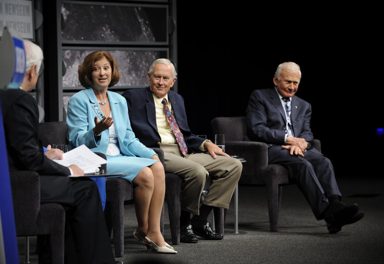 Veteran journalist Nick Clooney, seated left back to camera, moderated a panel discussion with Apollo 11 astronaut Buzz Aldrin, far right, Charlie Duke of Apollo 16, John Grunsfeld, of the recent Hubble mission, not seen and Goddard Space Flight Center deputy director Laurie Leshin, second from left, Monday, July 20, 2009, at the Newseum in Washington as part of the commemoration of the 40th Anniversary of the Apollo 11 moon landing. Photo Credit: (NASA/Bill Ingalls)