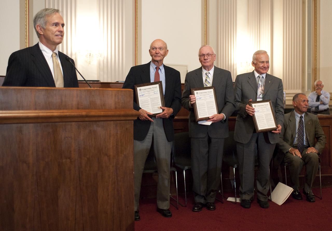 Apollo 11 Astronauts, from left, Michael Collins, Neil Armstrong, Buzz Aldrin and NASA Administrator Charles Bolden attend the U.S House of Representatives Committee on Science and Technology tribute to the Apollo 11 Astronauts at the Cannon House Office Building on Capitol Hill, Tuesday, July 21, 2009 in Washington.  The Committee presented the three Apollo 11 astronauts with a framed copy of House Resolution 607 honoring their achievement, and announced passage of legislation awarding them and John Glenn the Congressional Gold Medal.  Photo Credit: (NASA/Bill Ingalls)