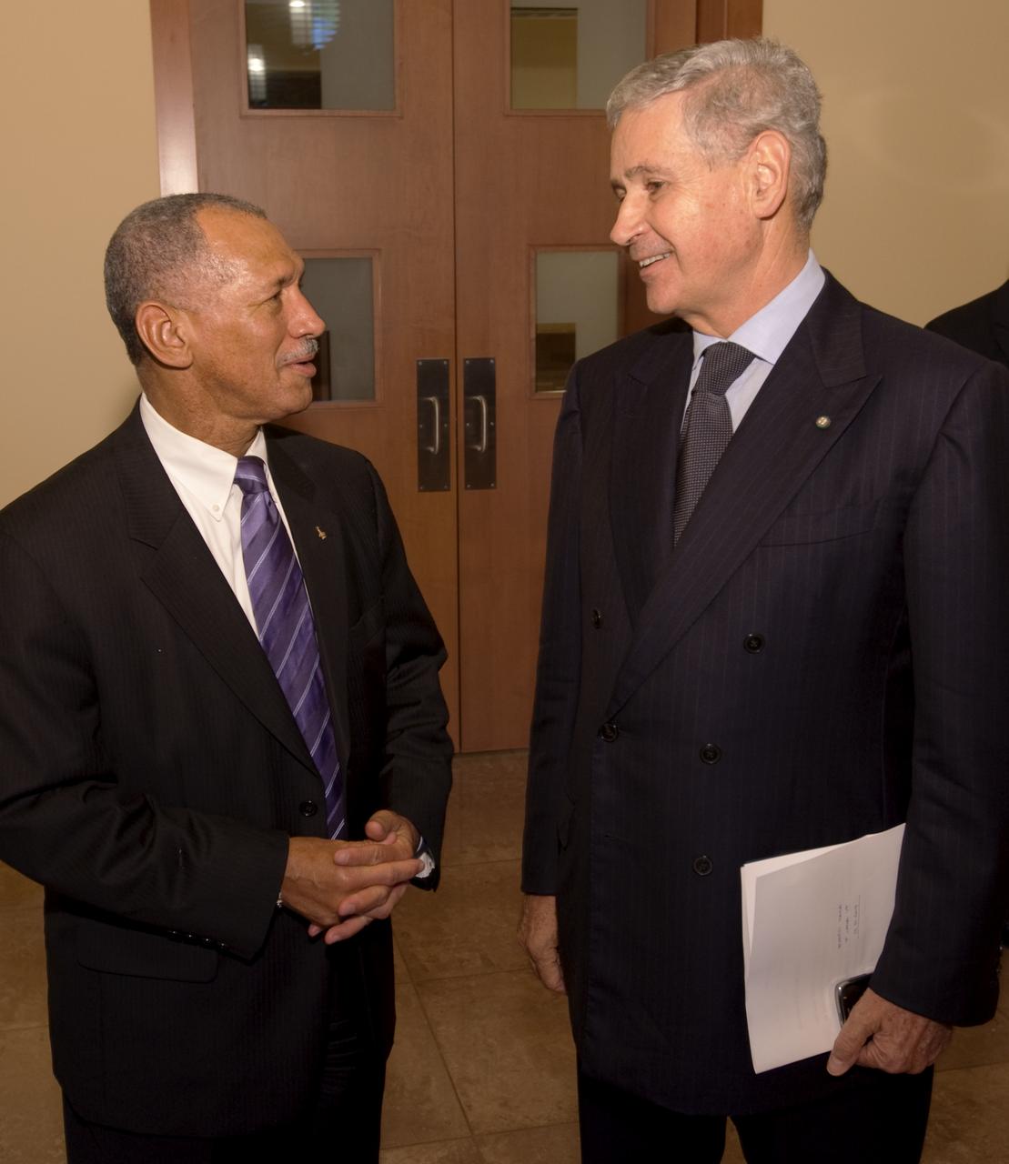 NASA Administrator Charles F. Bolden Jr., left, speaks with Giovanni Castellaneta, Ambassador of Italy, during a visit with the crew of STS-125 to the Embassy of Italy in Washington, Thursday, July 23, 2009. Photo Credit: (NASA/Bill Ingalls)