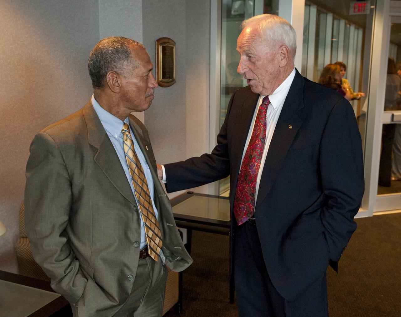 NASA Administrator Charles Bolden, left, visits with Apollo astronaut Al Worden prior to a ceremony, Thursday, July 30, 2009, where Worden was honored with the presentation of the an Ambassador of Exploration Award for his contributions to the U.S. space program at Kennedy Space Center, Fla. Worden served as command module pilot for the Apollo 15 mission. Photo Credit: (NASA/Bill Ingalls)