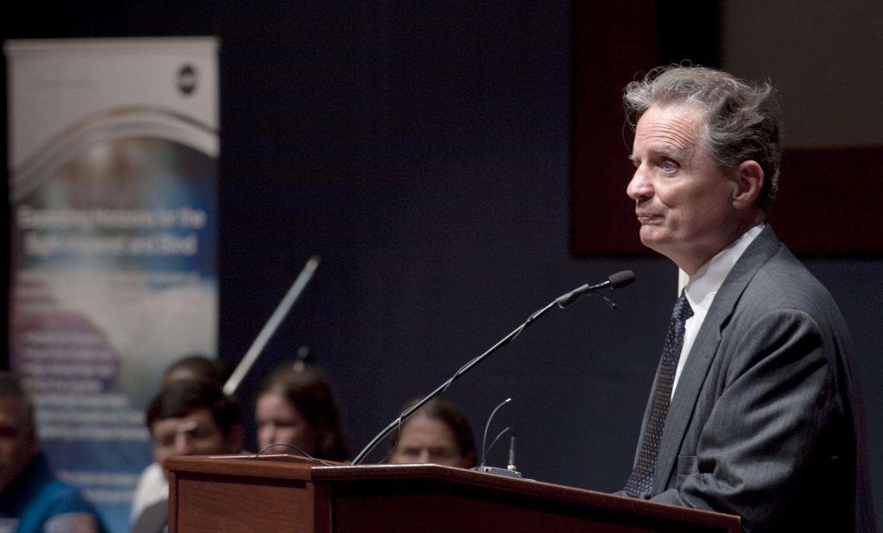Dr. Marc Mauer, president of the National Federation of the Blind speaks at a ceremony where senior NASA officials presented the NFB with two Louis Braille Bicentennial Silver Dollars that flew on Space Shuttle Atlantis' mission (STS-125) to the Hubble Space Telescope in May 2009, Friday evening, July 31, 2009, at the Capitol Visitors Center in Washington. Photo Credit: (NASA/Paul E. Alers)
