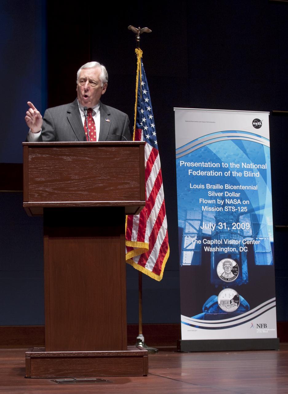 House Majority Leader U.S. Rep. Steny Hoyer, D-Md., speaks at a ceremony where senior NASA officials presented the National Federation of the Blind with two Louis Braille Bicentennial Silver Dollars that flew on Space Shuttle Atlantis' mission (STS-125) to the Hubble Space Telescope in May 2009, Friday evening, July 31, 2009, at the Capitol Visitors Center in Washington. Photo Credit: (NASA/Paul E. Alers)