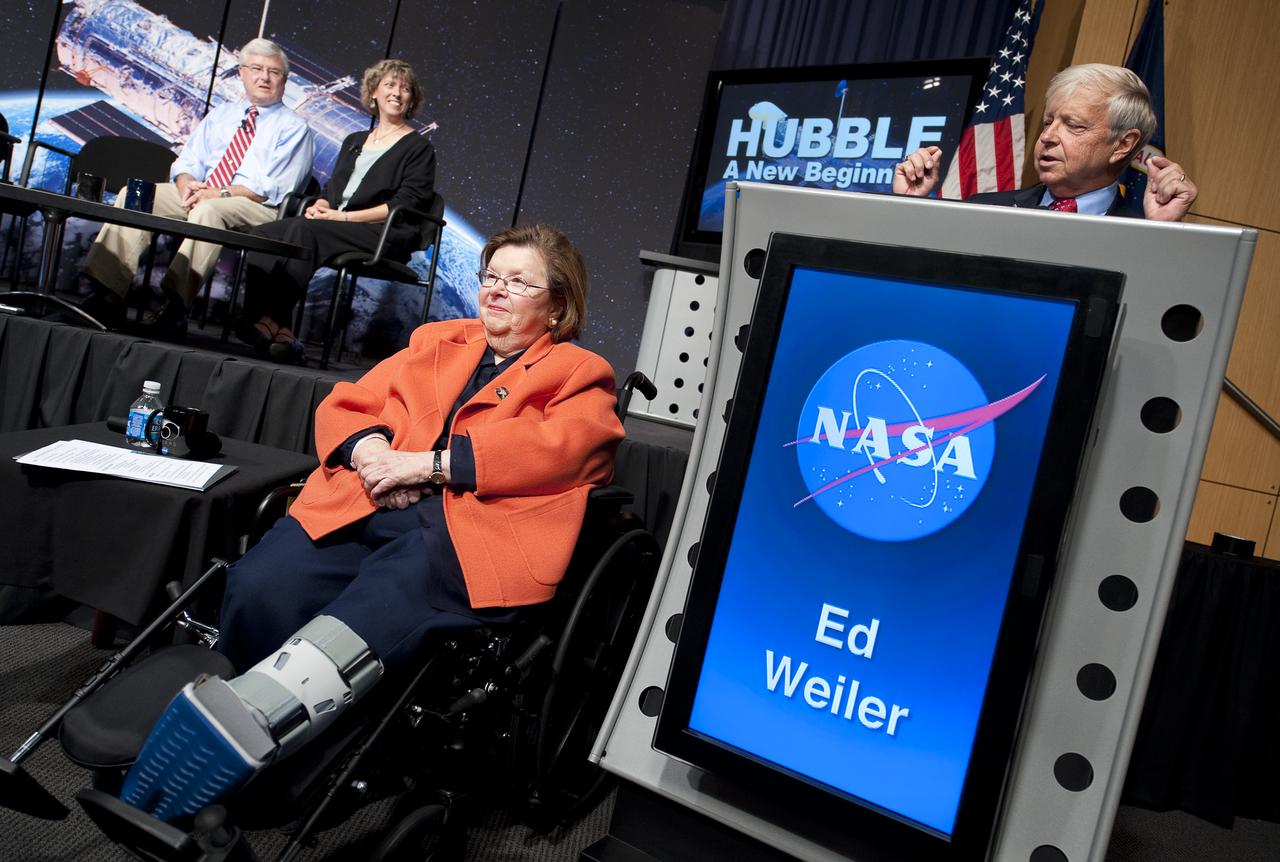 NASA Associate Administrator of the Science Mission Directorate Dr. Edward J. Weiler speaks at the podium as Sen. Barbara A. Mikulski, D-Md., left, listens during a press conference where NASA unveiled new images from NASA's Hubble Space Telescope Wednesday, Sept. 9, 2009 at NASA Headquarters in Washington. The images were from four of the telescopes' six operating science instruments. Photo Credit: (NASA/Bill Ingalls)