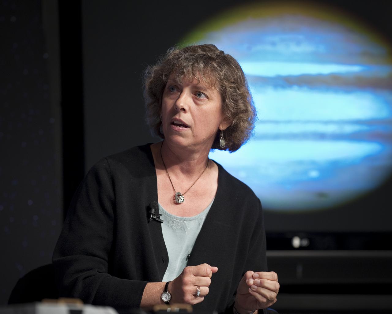 Heidi Hammel, senior research scientist at the Space Science Institute in Boulder, Colorado discusses newly released images from NASA's Hubble Space Telescope Wednesday, Sept. 9, 2009 at NASA Headquarters in Washington. The images were from four of the telescopes' six operating science instruments. Photo Credit: (NASA/Bill Ingalls)