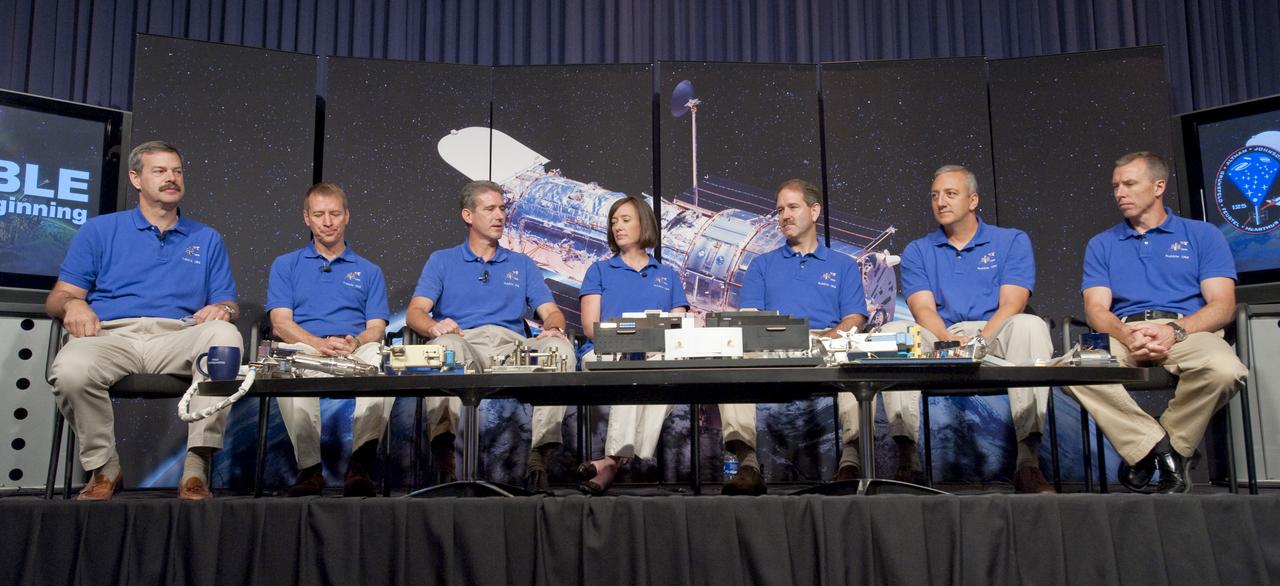 STS-125 crew members from left, Commander Scott Altman, Pilot Gregory Johnson, Mission Specialist Michael Good, Mission Specialist Megan McArthur, Mission Specialist John Grunsfeld, Mission Specialist Michael Massimino and Mission Specialist Andrew Feustel,  are seen during a press conference, Wednesday, Sept. 9, 2009, after astronomers declared the NASA's Hubble Space Telescope a fully rejuvenated observatory with the release Wednesday of observations from four of its six operating science instruments at NASA Headquarters in Washington. Photo Credit: (NASA/Paul E. Alers)