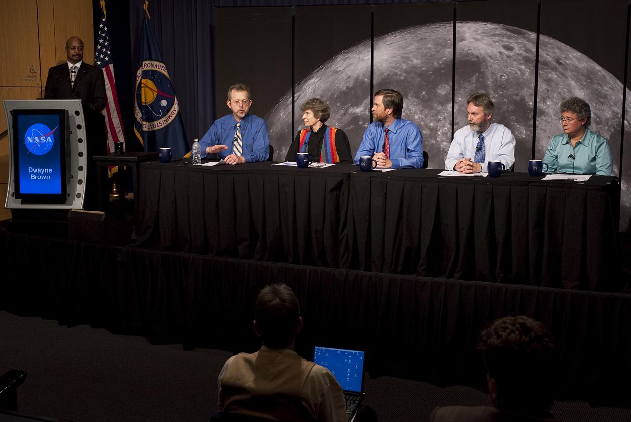 Jim Green (second from left), director, Planetary Science Division, Science Mission Directorate at NASA Headquarters in Washington discusses NASA’s findings of water molecules in the polar regions of the moon at a press conference at NASA Headquarters, September 24, 2009.  Photo Credit: (NASA/Carla Cioffi)
