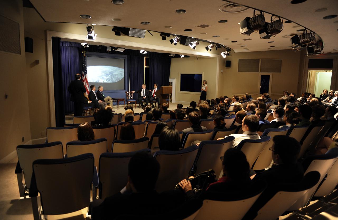STS-127 Commander Mark Polansky, standing left, talks about the recent mission to White House interns at the Eisenhower Executiive Office Building in Washington, Thursday, Sept. 24, 2009. Seated from left are crew members Julie Payette, Christopher Cassidy, David Wolf, Douglas Hurley and Thomas Marshburn. Photo Credit: (NASA/Paul E. Alers)