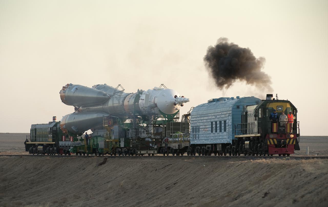 A Russian security patrol officer stands watch along the railroad tracks as the Soyuz rocket is rolled out to the launch pad Monday, Sept. 28, 2009 at the Baikonur Cosmodrome in Kazakhstan.  The Soyuz is scheduled to launch the crew of Expedition 21 and a spaceflight participant on Sept. 30, 2009.  Photo Credit: (NASA/Bill Ingalls)