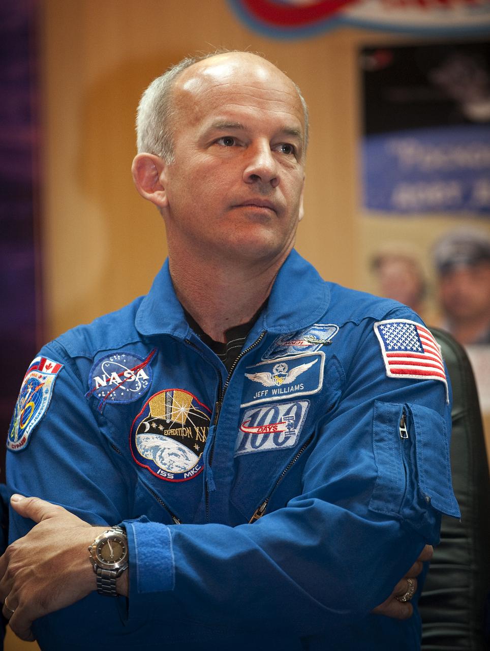 Expedition 21 Flight Engineer Jeffrey N. Williams listens to a reporter's question at a press conference, Tuesday, Sept. 29, 2009 at the Cosmonaut Hotel in Baikonur, Kazakhstan. Williams is scheduled to launch onboard a Soyuz rocket to the International Space Station (ISS) with Expedition 21 Flight Engineer Maxim Suraev and Spaceflight Participant Guy Laliberté on Wednesday, Sept. 30, 2009 from the Baikonur Cosmodrome in Kazakhstan.  Photo Credit: (NASA/Bill Ingalls)