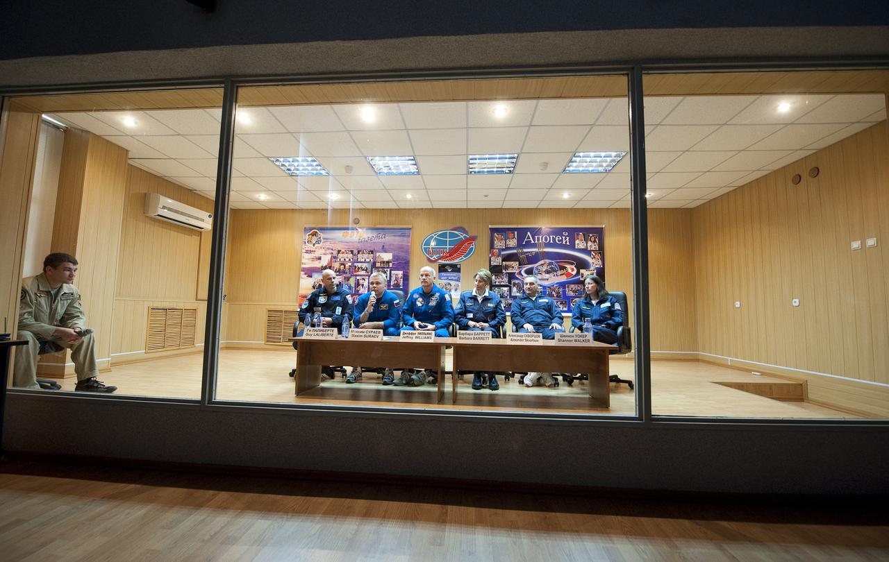 From left, Spaceflight Participant Guy Laliberté, Expedition 21 Flight Engineer Maxim Suraev, Expedition 21 Flight Engineer Jeffrey N. Williams, Backup Spaceflight Participant Barbara Barrett, backup Expedition 21 Commander Aleksandr Skvortsov, and backup Expedition 21 Flight Engineer Shannon Walker are seen during a press conference, Tuesday, Sept. 29, 2009 at the Cosmonaut Hotel in Baikonur, Kazakhstan. Williams, Suraev and Laliberté are scheduled to launch onboard a Soyuz rocket to the International Space Station (ISS) on Wednesday, Sept. 30, 2009 from the Baikonur Cosmodrome in Kazakhstan. Photo Credit: (NASA/Bill Ingalls)