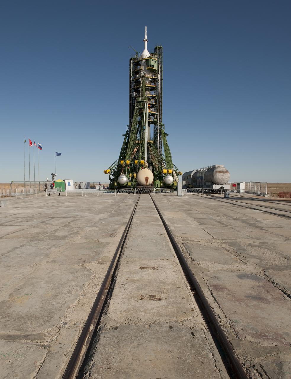 The Soyuz rocket sits ready on the launch pad in Baikonur, Kazakhstan, Tuesday, Sept., 29, 2009 the day before Expedition 21 Flight Engineer Maxim Suraev, Expedition 21 Flight Engineer Jeffrey N. Williams and Spaceflight Participant Guy Laliberté are scheduled to launch to the International Space Station (ISS).  Photo Credit: (NASA/Bill Ingalls)
