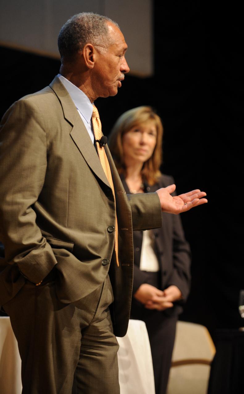 NASA Administrator Charles Boldenl left, speaks as Deputy Administrator Lori Garver looks on at the 2009 NASA Executive Summit, Tuesday, Oct. 6, 2009, at the Ronald Reagan Building in Washington. (Photo Credit: (NASA/Paul E. Alers)