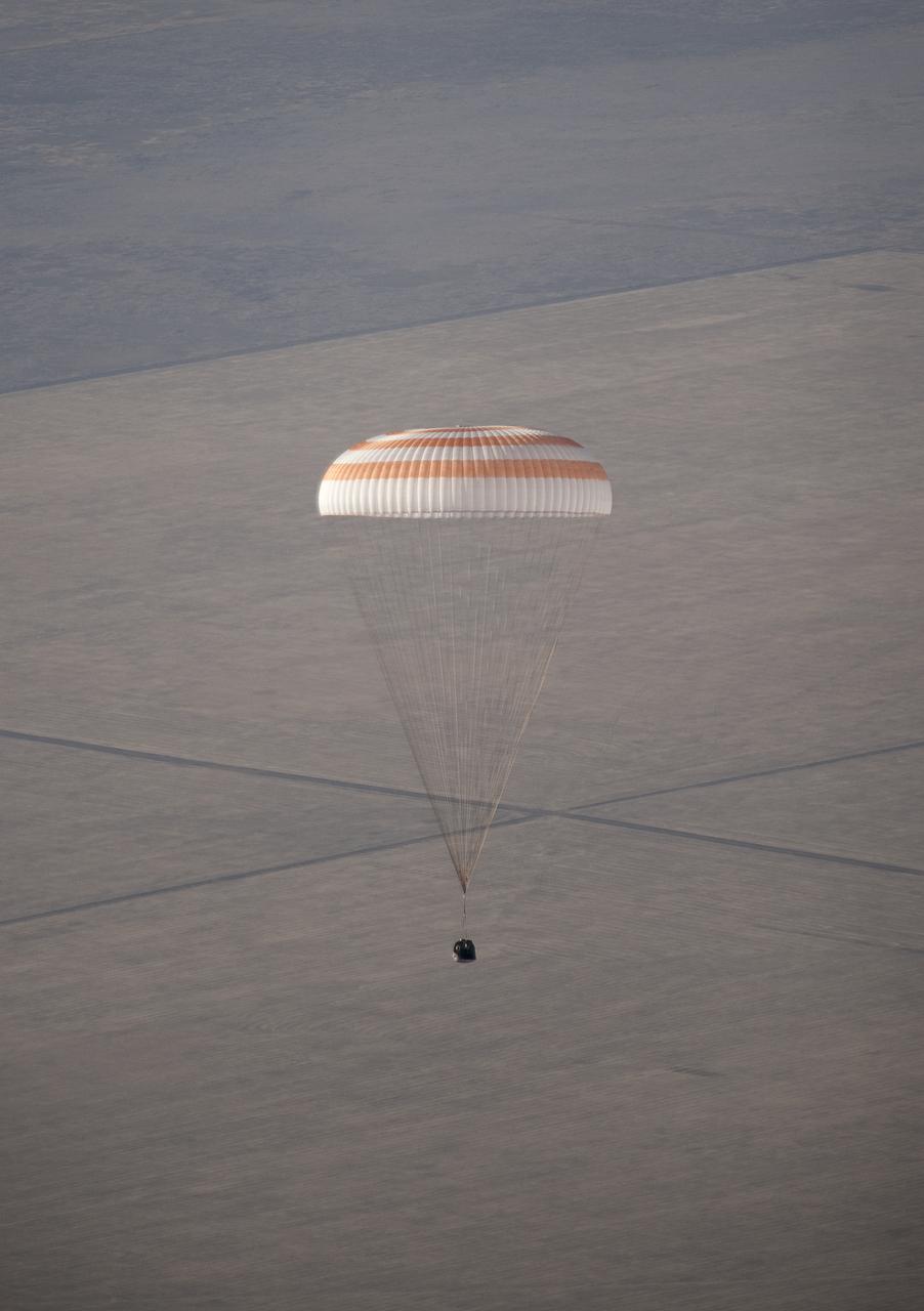 The Soyuz TMA-14 spacecraft is seen as it lands with Expedition 20 Commander Gennady Padalka, Flight Engineer Michael Barratt, and spaceflight participant Guy Laliberté near the town of Arkalyk, Kazakhstan on Sunday, Oct. 11, 2009. Padalka and Barratt are returning from six months onboard the International Space Station, along with Laliberté who arrived at the station on Oct. 2 with Expedition 21 Flight Engineers Jeff Williams and Maxim Suraev aboard the Soyuz TMA-16 spacecraft. Photo Credit: (NASA/Bill Ingalls)