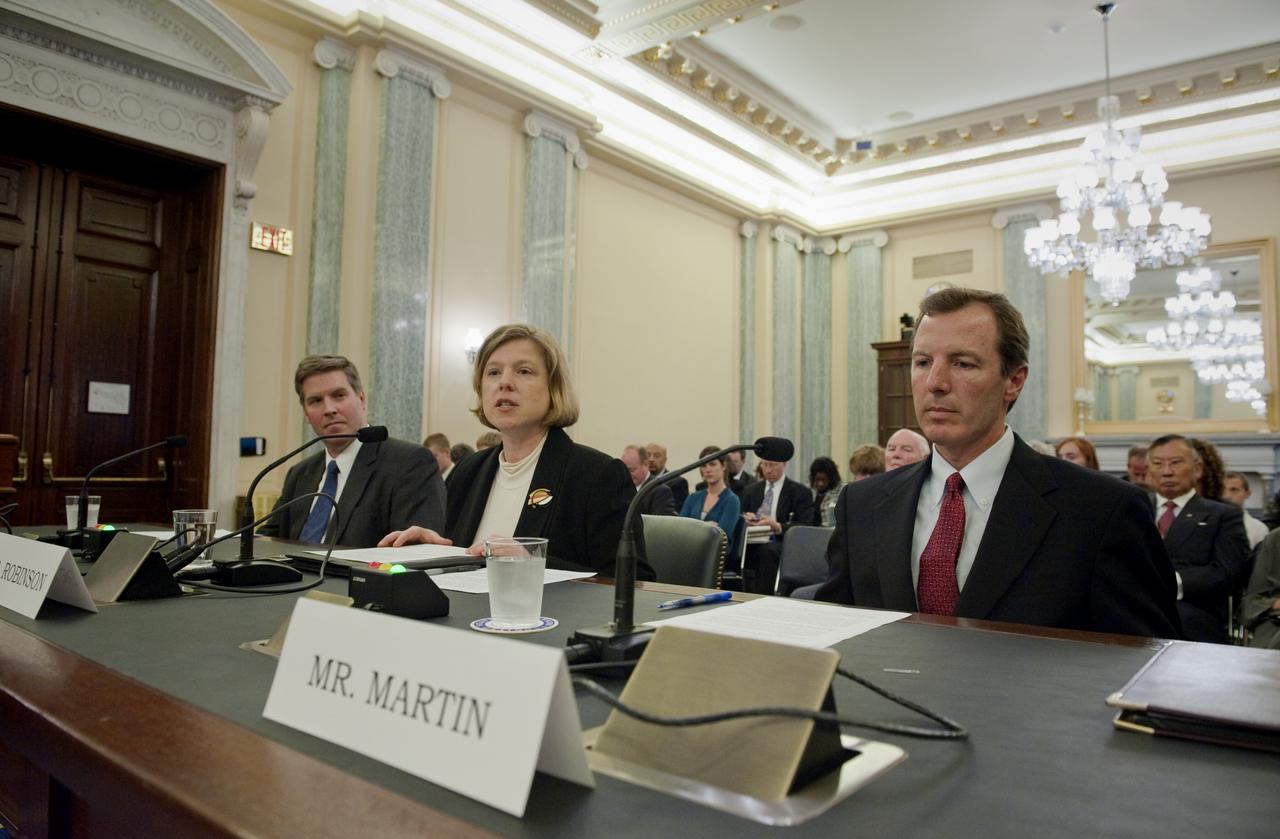 Dr. Elizabeth M. Robinson, nominee for Chief Financial Officer for NASA, center, answers questions during her confirmation hearing in front of the Senate Committee on Commerce, Science and Transportation, Thursday, Oct. 15, 2009, on Capitol Hill in Washington. Robinson is flanked by Dr. Patrick Gallagher, nominee to be Assistant Secretary of the Transportation Security Administration at the U.S. Department of Commerce, far left, and Paul K. Martin, nominee to be Inspector General at NASA. Photo Credit: (NASA/Paul E. Alers)