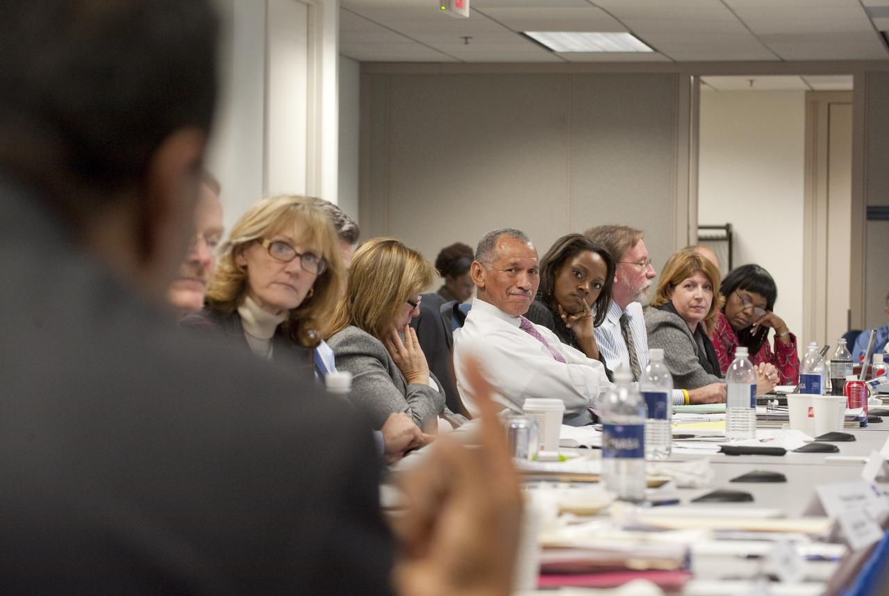 NASA Administrator Charles F. Bolden, center, listens to a participant during a discussion of topics at an Education Summitt, Monday, Nov. 2, 2009, at NASA Headquarters in Washington. Photo Credit: (NASA/Paul E. Alers)