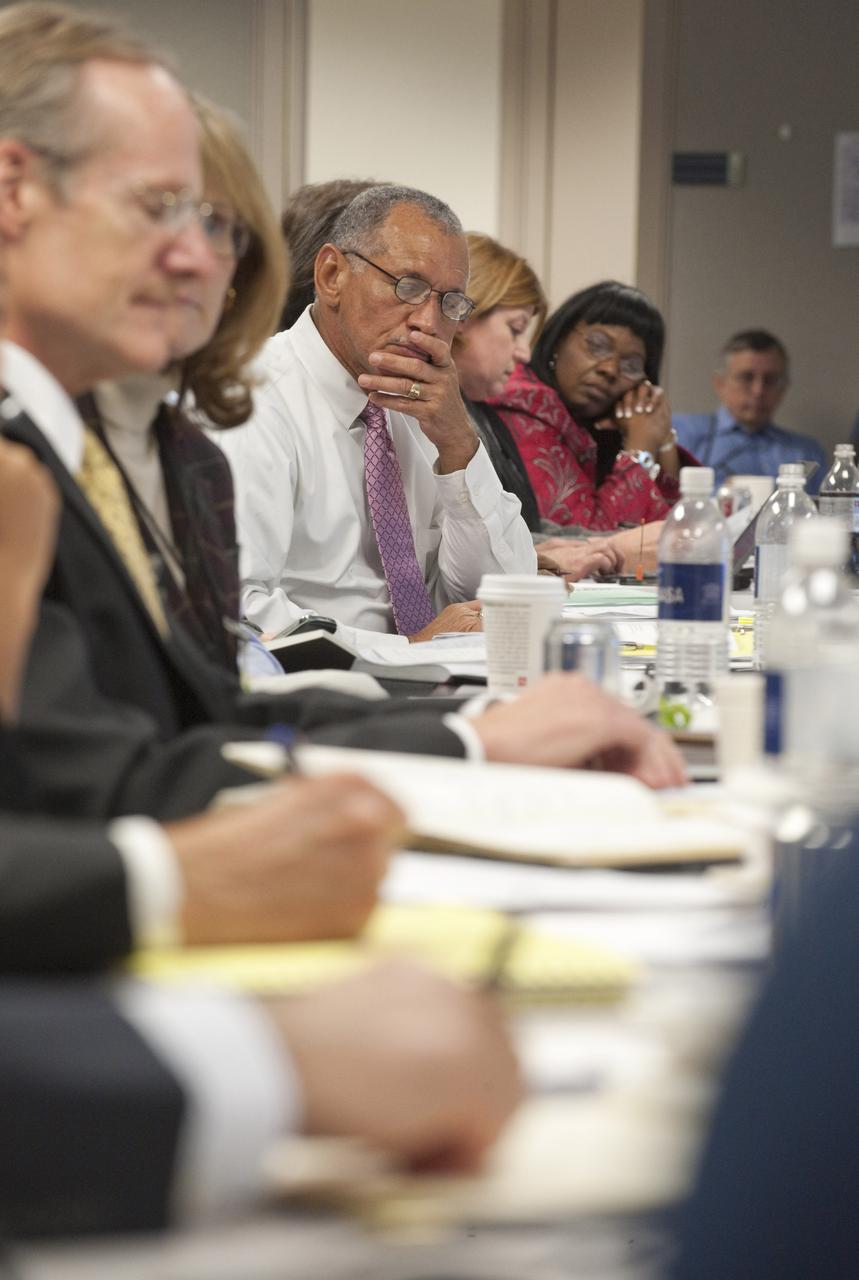 NASA Administrator Charles F. Bolden, center, looks over his notes during discussions at an Education Summitt, Monday, Nov. 2, 2009, at NASA Headquarters in Washington. Photo Credit: (NASA/Paul E. Alers)