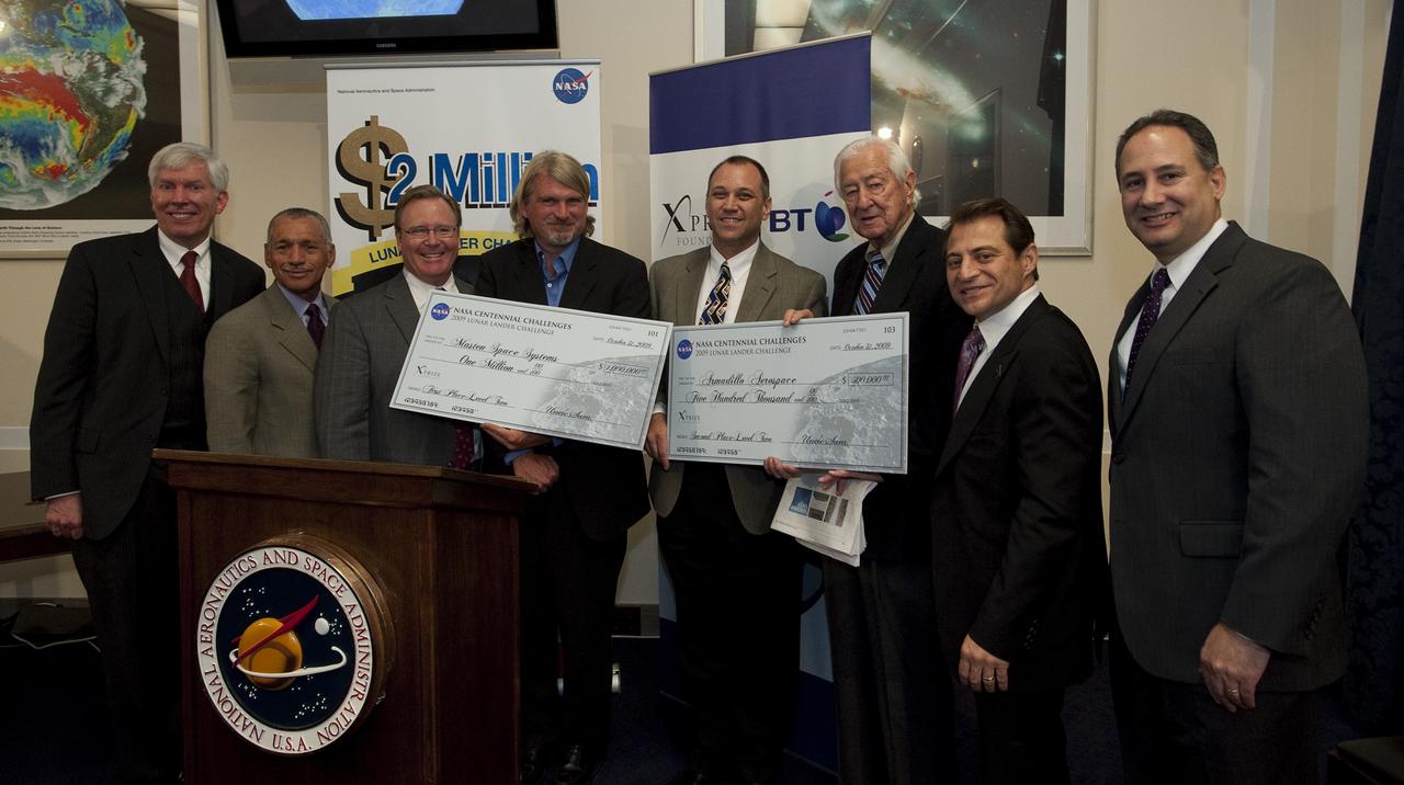 NASA and the X PRIZE Foundation announced the winners of the Northrop Grumman Lunar Lander Challenge at an awards ceremony at the Rayburn House Office Building, Thursday, Nov. 5, 2009 in Washington, DC.  From left to right, George Nield, Associate Administrator of Commercial Space Transportation, FAA; Charles Bolden, NASA Administrator; Doug Comstock, Director, Innovative Partnerships Program, NASA; David Masten, CEO, Masten Space Systems; Phil Eaton, VP, Operations, Armadillo Aerospace; U.S. Rep. Ralph Hall (R-TX); Peter Diamandis, Chairman and CEO, X PRIZE Foundation and Mitch Waldman, VP, Advanced Programs & Technology, Northrop Grumman.  Photo Credit: (NASA/Carla Cioffi) 