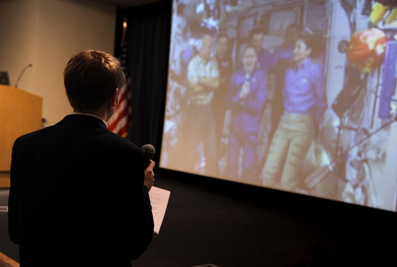 An unidentified student speaks with astronauts aboard the Internatiional Space Station (ISS) via downlink during an event at the U.S. Department of Education, Thursday, Nov. 5, 2009, in Washington. NASA Administrator Charles Bolden and Secretary of Education Arne Duncan hosted Washington area middle and high school students Thursday for a live discussion with astronauts aboard the International Space Station. The event was part of the 10th annual celebration of International Education Week. Photo Credit: (NASA/Paul E. Alers)
