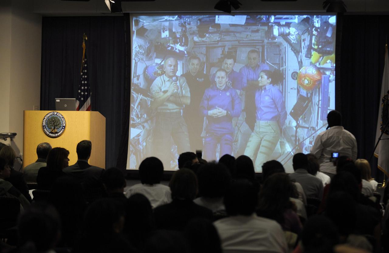 Students speak with astronauts aboard the International Space Station (ISS) via downlink during an event at the U.S. Department of Education, Thursday, Nov. 5, 2009, in Washington. NASA Administrator Charles Bolden and Secretary of Education Arne Duncan hosted Washington area middle and high school students Thursday for a live discussion with astronauts aboard the International Space Station. The event was part of the 10th annual celebration of International Education Week. Photo Credit: (NASA/Paul E. Alers)