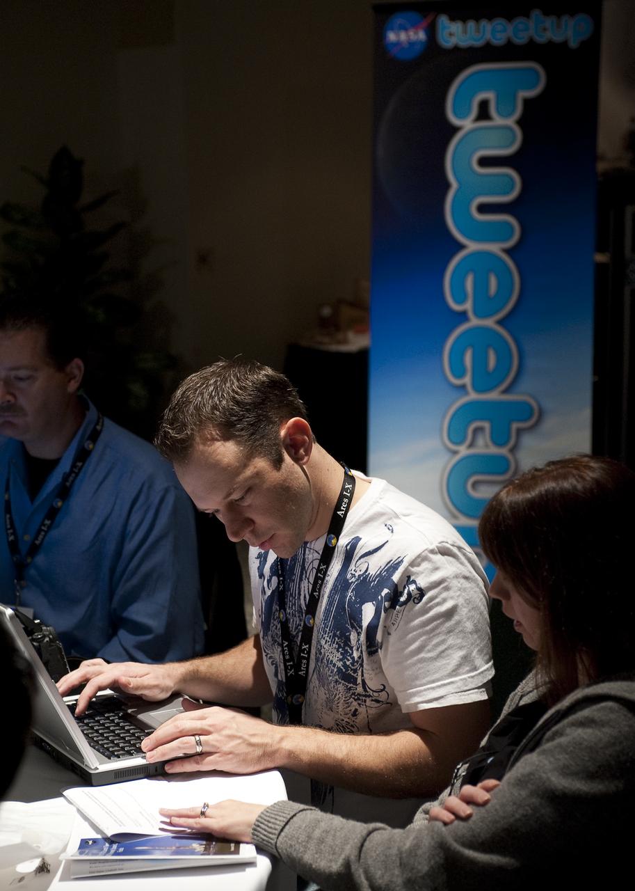 Twitter user Paul Thompson from Dallas, Texas, who goes by the twitter name @flyingphotog, uses his laptop during a two-day NASA Tweetup event held at NASA's Kennedy Space Center in Cape Canaveral, Fla, Sunday, Nov. 15, 2009. NASA Twitter followers in attendance will have the opportunity to take a tour of NASA's Kennedy Space Center, view the space shuttle launch and speak with shuttle technicians, engineers, astronauts and managers.  Photo Credit: (NASA/Carla Cioffi)