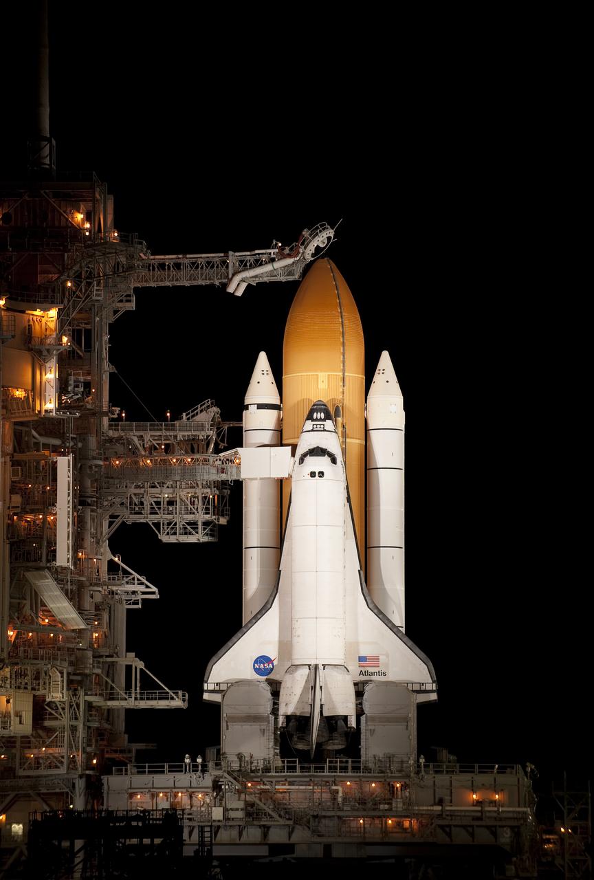 The space shuttle Atlantis is seen on launch pad 39a of the NASA Kennedy Space Center shortly after the rotating service structure was rolled back, Sunday, Nov. 15, 2009, Cape Canaveral, FL.  Atlantis is scheduled to launch at 2:28p.m. EST, Monday, Nov. 16, 2009. Photo Credit: (NASA/Bill Ingalls)
