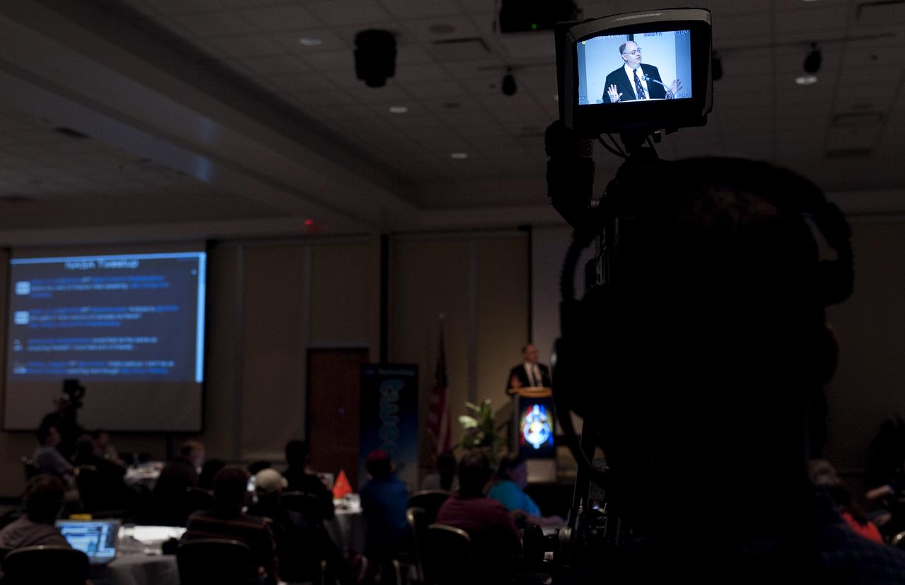 Wayne Hale, NASA strategic program planning manager, is seen on video camera as he speaks during a two-day NASA Tweetup event held at NASA's Kennedy Space Center in Cape Canaveral, Fla, Sunday, Nov. 15, 2009. NASA Twitter followers in attendance will have the opportunity to take a tour of NASA's Kennedy Space Center, view the STS-129 space shuttle launch and speak with shuttle technicians, engineers, astronauts and managers. Photo Credit: (NASA/Carla Cioffi)¬†