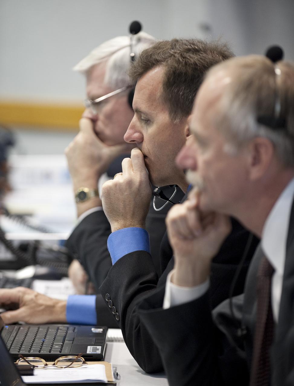 LeRoy E. Cain, NASA manager of Launch Integration, center and other  NASA mission managers, monitor the countdown to launch of the space shuttle Atlantis from firing room four of the NASA Kennedy Space Center, Monday, Nov. 16, 2009, Cape Canaveral, Fla.  Space shuttle Atlantis and its six-member crew began the 11-day STS-129 mission to the International Space Station. The shuttle will transport spare hardware to the outpost and return a station crew member who spent more than two months in space.  Photo Credit: (NASA/Bill Ingalls)