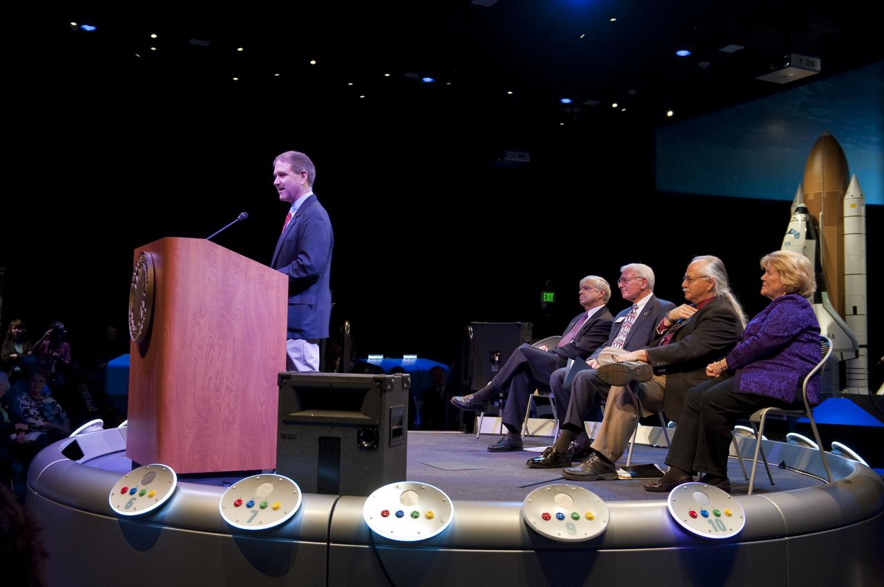 STS-125 astronaut John Grunsfeld speaks during a press briefing at the new "Moving Beyond Earth," a new exhibition at the National Air and Space Museum in Washingon, Wednesday, Nov. 18, 2009. Moving Beyond Earth is an immersive exhibition that places visitors “in orbit” in the shuttle and space-station era to explore recent human spaceflight and future possibilities. Photo Credit: (NASA/Paul E. Alers)