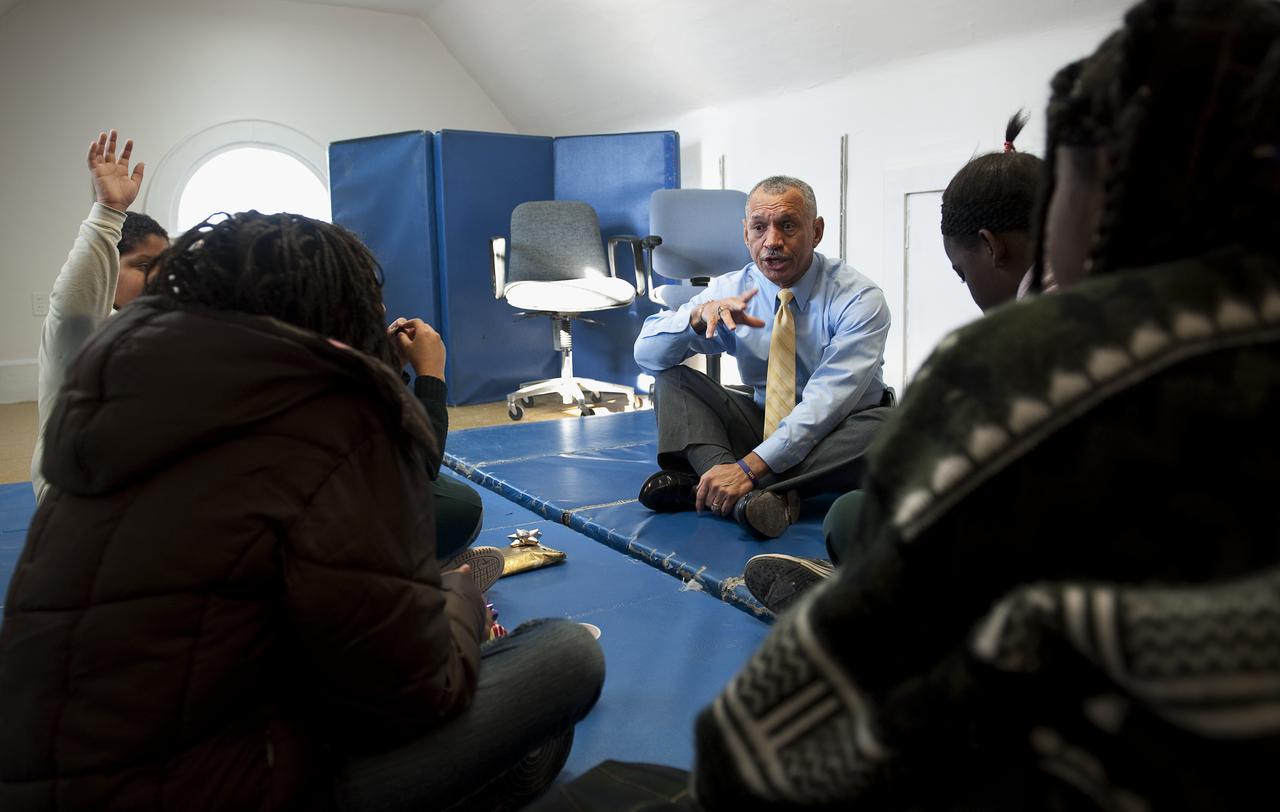 NASA Administrator Charles Bolden spent time volunteering with DC Cares at the Park View Recreation Center in Washington, DC for their Santa's Workshop program, Monday, Dec. 14, 2009.  Mr. Bolden spoke with students about his experience as a former NASA astronaut and current NASA Administrator, encouraging them to study math and science and to stay in school.  Photo Credit:  (NASA/Bill Ingalls)