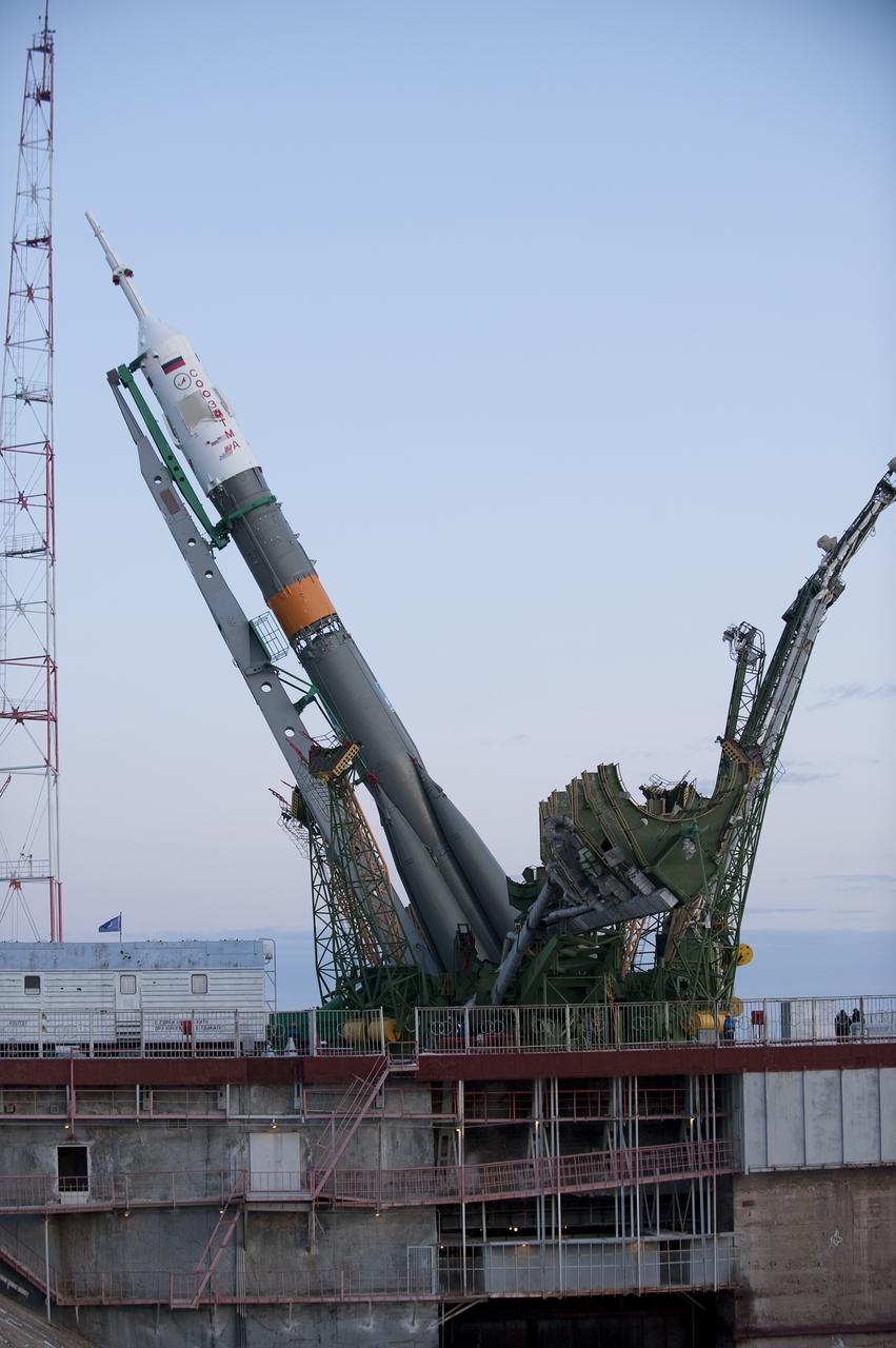The Soyuz TMA-17 spacecraft is raised into vertical position at the launch pad of the Baikonur Cosmodrome, Kazakhstan, Friday, Dec. 18, 2009.  The launch of the Soyuz spacecraft with Expedition 22 NASA Flight Engineer Timothy J. Creamer of the U.S., Soyuz Commander Oleg Kotov of Russia and Flight Engineer Soichi Noguchi of Japan, is scheduled for Monday, Dec., 21, 2009 at 3:52a.m. Kazakhstan time.  Photo Credit (NASA/Bill Ingalls)