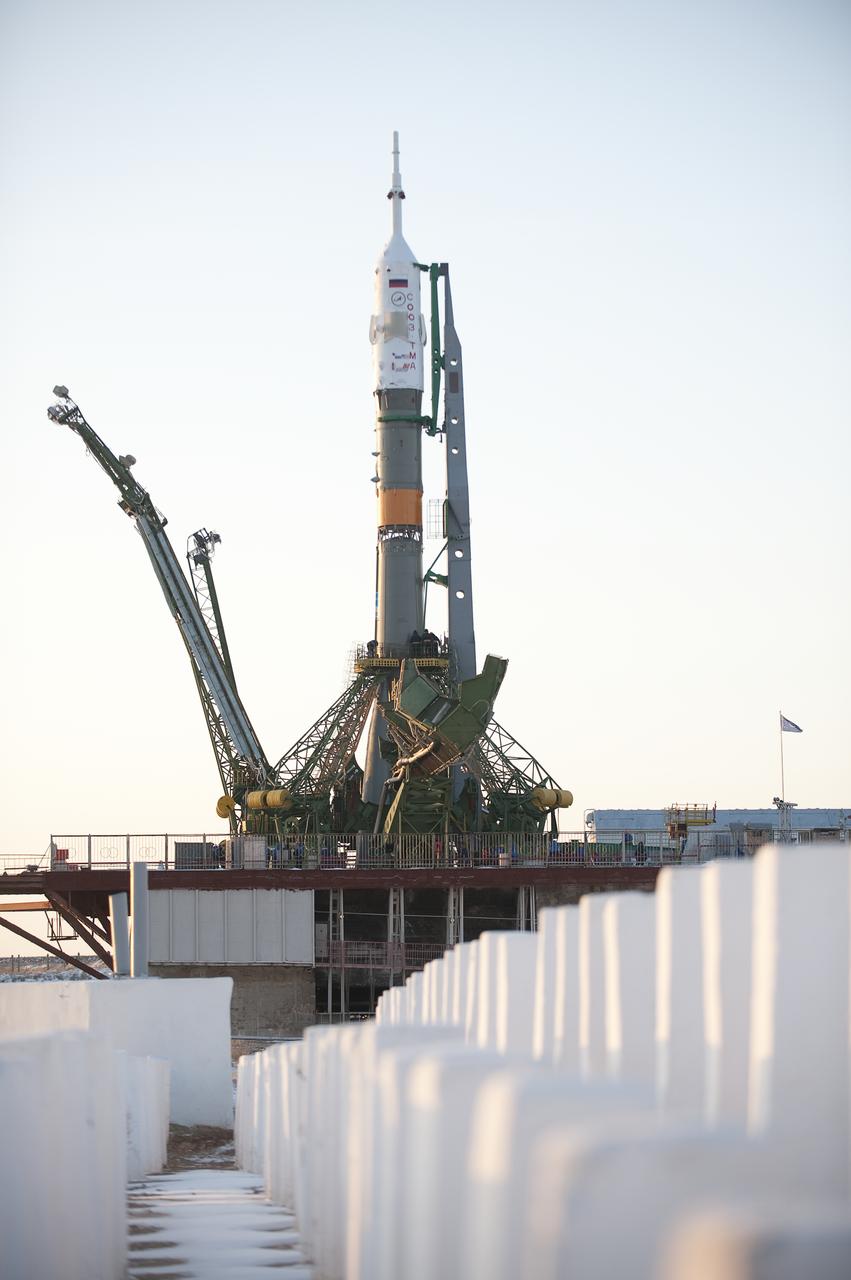 The Soyuz TMA-17 spacecraft is raised into vertical position at the launch pad of the Baikonur Cosmodrome, Kazakhstan, Friday, Dec. 18, 2009.  The launch of the Soyuz spacecraft with Expedition 22 NASA Flight Engineer Timothy J. Creamer of the U.S., Soyuz Commander Oleg Kotov of Russia and Flight Engineer Soichi Noguchi of Japan, is scheduled for Monday, Dec., 21, 2009 at 3:52a.m. Kazakhstan time.  Photo Credit (NASA/Bill Ingalls)