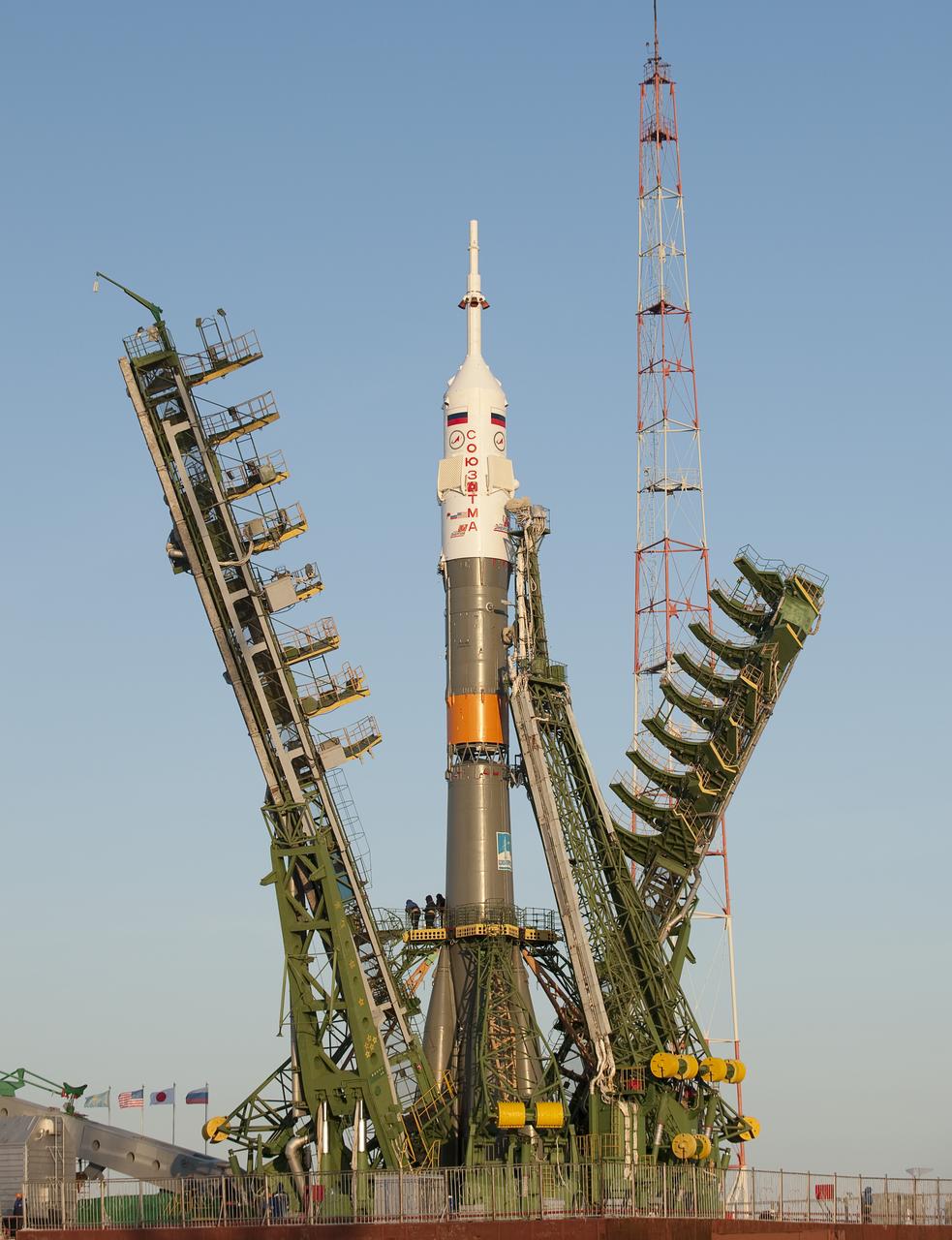 The Soyuz TMA-17 spacecraft is raised into vertical position at the launch pad of the Baikonur Cosmodrome, Kazakhstan, Friday, Dec. 18, 2009.  The launch of the Soyuz spacecraft with Expedition 22 NASA Flight Engineer Timothy J. Creamer of the U.S., Soyuz Commander Oleg Kotov of Russia and Flight Engineer Soichi Noguchi of Japan, is scheduled for Monday, Dec., 21, 2009 at 3:52a.m. Kazakhstan time.  Photo Credit (NASA/Bill Ingalls)