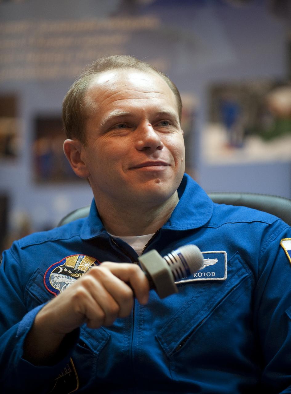 Expedition 22 Soyuz Commander Oleg Kotov listens to a reporter's question during a press conference held at the Cosmonaut Hotel in Baikonur, Kazakhstan, Saturday, Dec., 19, 2009. The launch of the Soyuz spacecraft with Expedition 22 NASA Flight Engineer Timothy J. Creamer of the U.S., Soyuz Commander Oleg Kotov of Russia and Flight Engineer Soichi Noguchi of Japan, is scheduled for Monday, Dec., 21, 2009 at 3:52a.m. Kazakhstan time.  Photo Credit (NASA/Bill Ingalls)