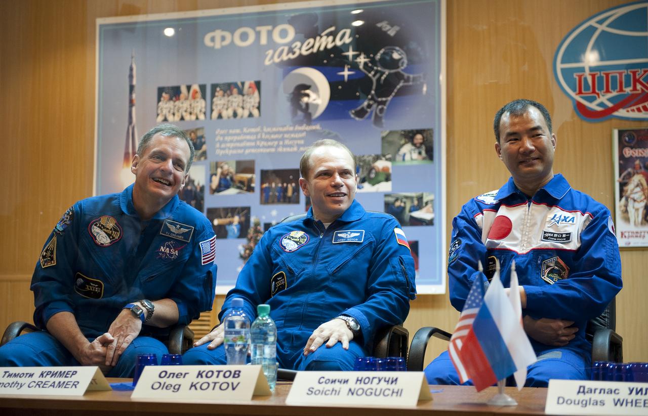 Expedition Flight Engineer Timothy J. Creamer, left, Soyuz Commander Oleg Kotov of Russia, center, and Flight Engineer Soichi Noguchi of the Japan listen to a reporter's question during a press conference held at the Cosmonaut Hotel in Baikonur, Kazakhstan, Saturday, Dec., 19, 2009. The launch of the Soyuz spacecraft with Creamer, Kotov, and Noguchi, is scheduled for Monday, Dec., 21, 2009 at 3:52a.m. Kazakhstan time.  Photo Credit (NASA/Bill Ingalls)