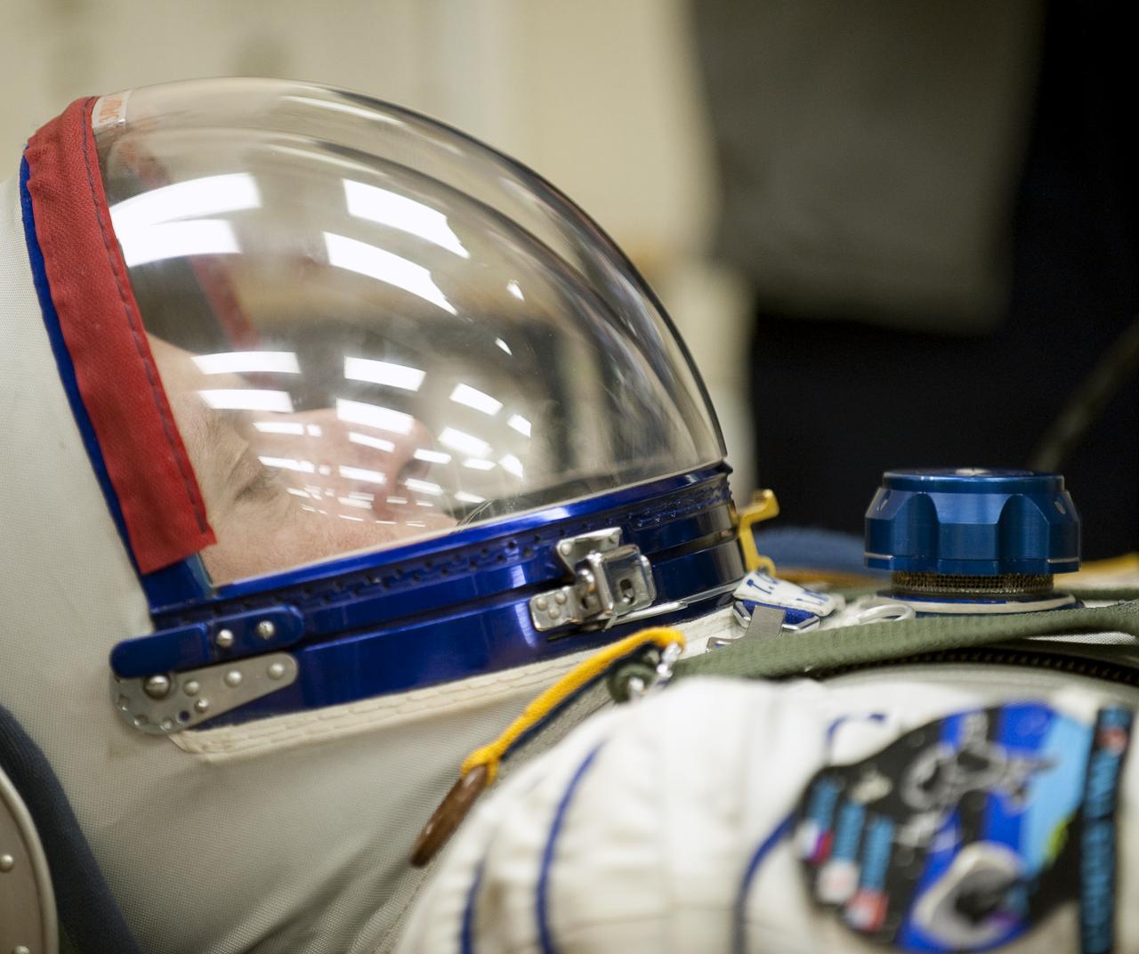 Expedition 22 NASA Flight Engineer Timothy J. Creamer of the U.S. has his Russian Sokol suit pressure checked at the Baikonur Cosmodrome in Baikonur, Kazakhstan, Monday, Dec. 21, 2009. Creamer and fellow Expedition 22 crew members, Soyuz Commander Oleg Kotov of Russia, and Flight Engineer Soichi Noguchi of Japan launched in their Soyuz TMA-17 rocket from the Baikonur Cosmodrome in Kazakhstan on Monday, Dec. 21, 2009. (Photo Credit: NASA/Bill Ingalls)