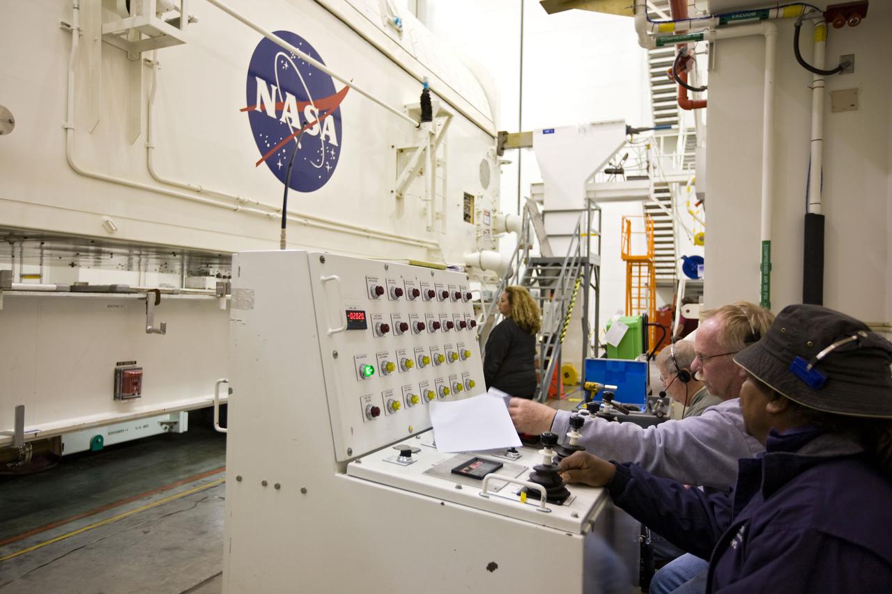 STS-130 PAYLOAD CANISTER TURN FROM HORIZONAL TO VERTICAL