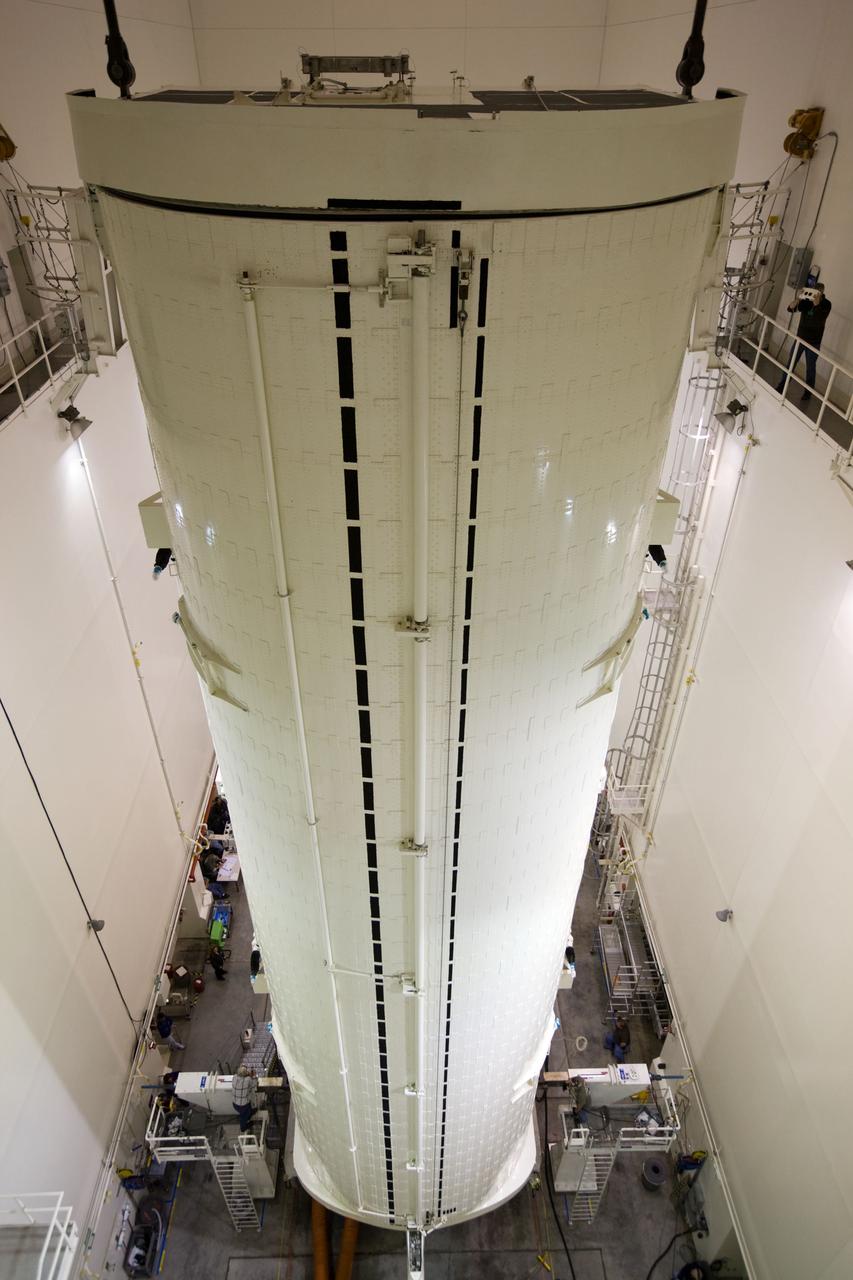 STS-130 PAYLOAD CANISTER TURN FROM HORIZONAL TO VERTICAL