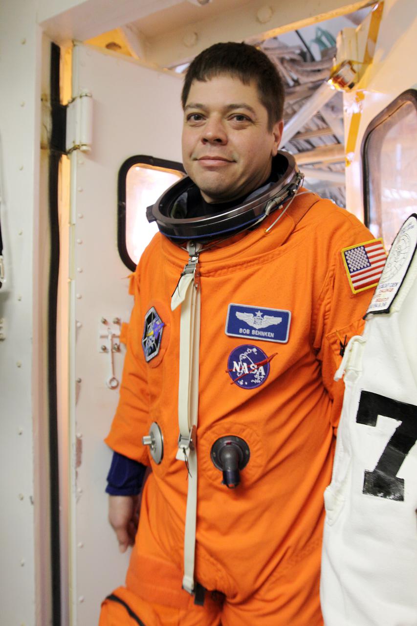CAPE CANAVERAL, Fla. - STS-130 Mission Specialist Robert Behnken enters the White Room at Launch Pad 39A at NASA's Kennedy Space Center in Florida. The members of space shuttle Endeavour's STS-130 crew are participating in a dress rehearsal for their upcoming launch, known as the Terminal Countdown Demonstration Test. Behnken will be making his second spaceflight on STS-130. The primary payload for the STS-130 mission is the International Space Station's Tranquility node, a pressurized module that will provide room for many of the station's life support systems. Attached to one end of Tranquility is a cupola, a unique work area with six windows on its sides and one on top. The cupola resembles a circular bay window and will provide a vastly improved view of the station's exterior. The multi-directional view will allow the crew to monitor spacewalks and docking operations, as well as provide a spectacular view of Earth and other celestial objects. The module was built in Turin, Italy, by Thales Alenia Space for the European Space Agency. Launch of STS-130 is targeted for Feb. 7. For information on the STS-130 mission and crew, visit http:__www.nasa.gov_mission_pages_shuttle_shuttlemissions_sts130_index.html. Photo credit: NASA_Troy Cryder