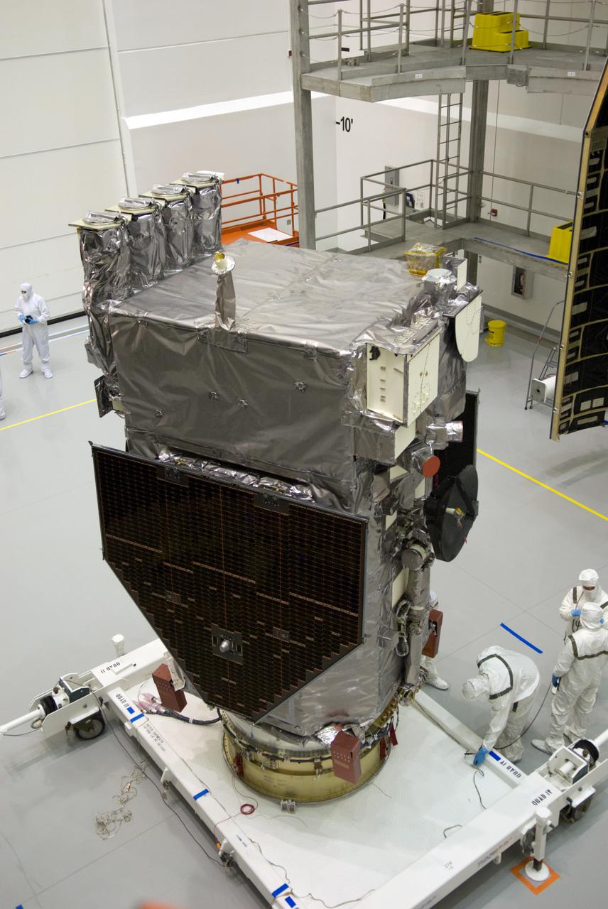 CAPE CANAVERAL, Fla. – At the Astrotech Space Operations facility in Titusville, Fla., processing of NASA's Solar Dynamics Observatory, or SDO, is complete, and it is ready to be installed into an Atlas V payload fairing.  SDO is the first mission in NASA's Living With a Star Program and is designed to study the causes of solar variability and its impacts on Earth. The spacecraft's long-term measurements will give solar scientists in-depth information to help characterize the interior of the Sun, the Sun's magnetic field, the hot plasma of the solar corona, and the density of radiation that creates the ionosphere of the planets. The information will be used to create better forecasts of space weather needed to protect the aircraft, satellites and astronauts living and working in space. Liftoff aboard an Atlas V rocket is targeted for Feb. 9 from Launch Complex 41 on Cape Canaveral Air Force Station. For information on SDO, visit http:__www.nasa.gov_sdo.  Photo credit: NASA_Jim Grossmann