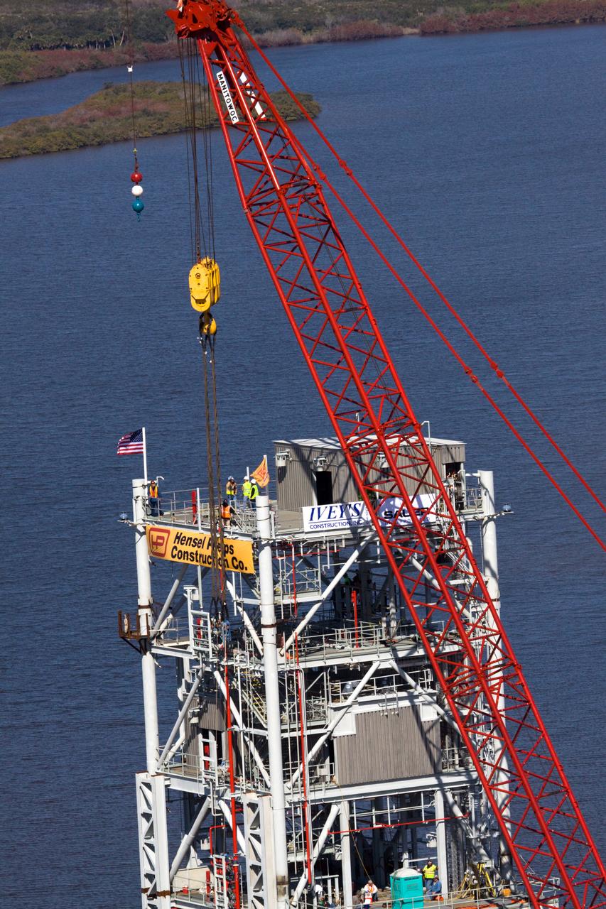 CONSTELLATION - NEW MLP CONSTRUCTION PROGRESS - 10TH SEGMENT TOWER LIFT - AS SEEN FROM VAB ROOF