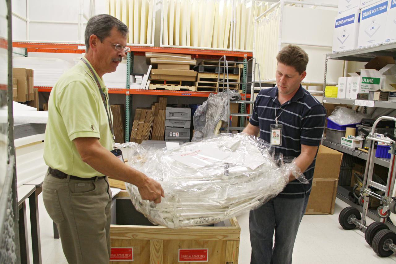 CAPE CANAVERAL, Fla. – Replacement high-pressure ammonia jumper hoses to support space shuttle Endeavour's STS-130 mission are unpacked from a transportation crate in the Space Station Processing Facility at NASA's Kennedy Space Center in Florida.  A problem arose during a prelaunch test Jan. 7 with one of four hoses that are needed to connect the ammonia loops of the International Space Station's Tranquility node to those of the Destiny laboratory.  A decision was made to use an alternate hose design for use as the primary jumper.  The new hoses are assembled from shorter hoses that were previously certified and tested.  Connection of the modules requires two ammonia loops, with two lines apiece, each of which must be connected to both Tranquility and Destiny to route cooling to and from the Tranquility module.  The primary payload for the STS-130 mission, Tranquility is a pressurized module that will provide additional room for crew members and many of the station's life support and environmental control systems. The node was built in Turin, Italy, by Thales Alenia Space for the European Space Agency.  Endeavour's launch is set for Feb. 7.  For information on the STS-130 mission and crew, visit http:__www.nasa.gov_mission_pages_shuttle_shuttlemissions_sts130_index.html.  Photo credit: NASA_Jack Pfaller