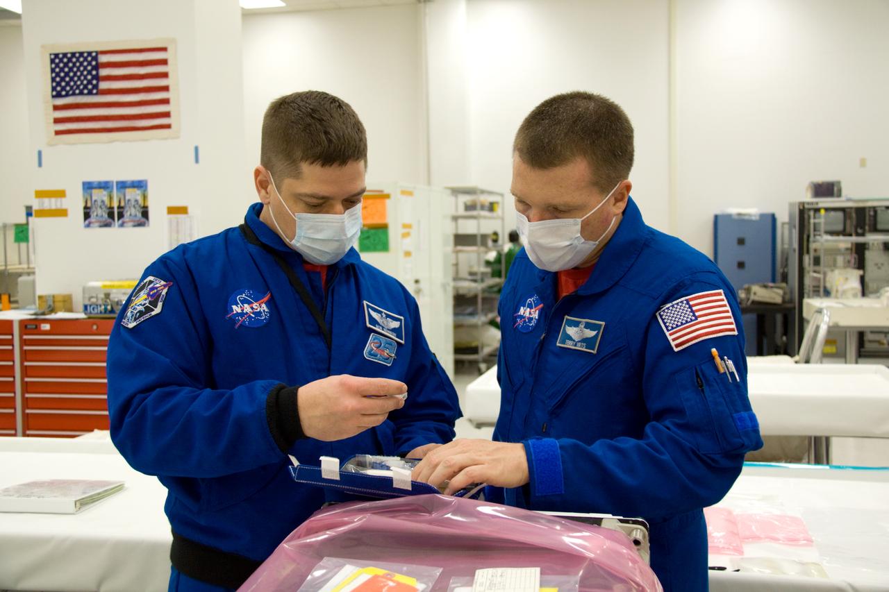 STS-130 LAUNCH L-5 CREW INSPECTS NEW AMMONIA LINES