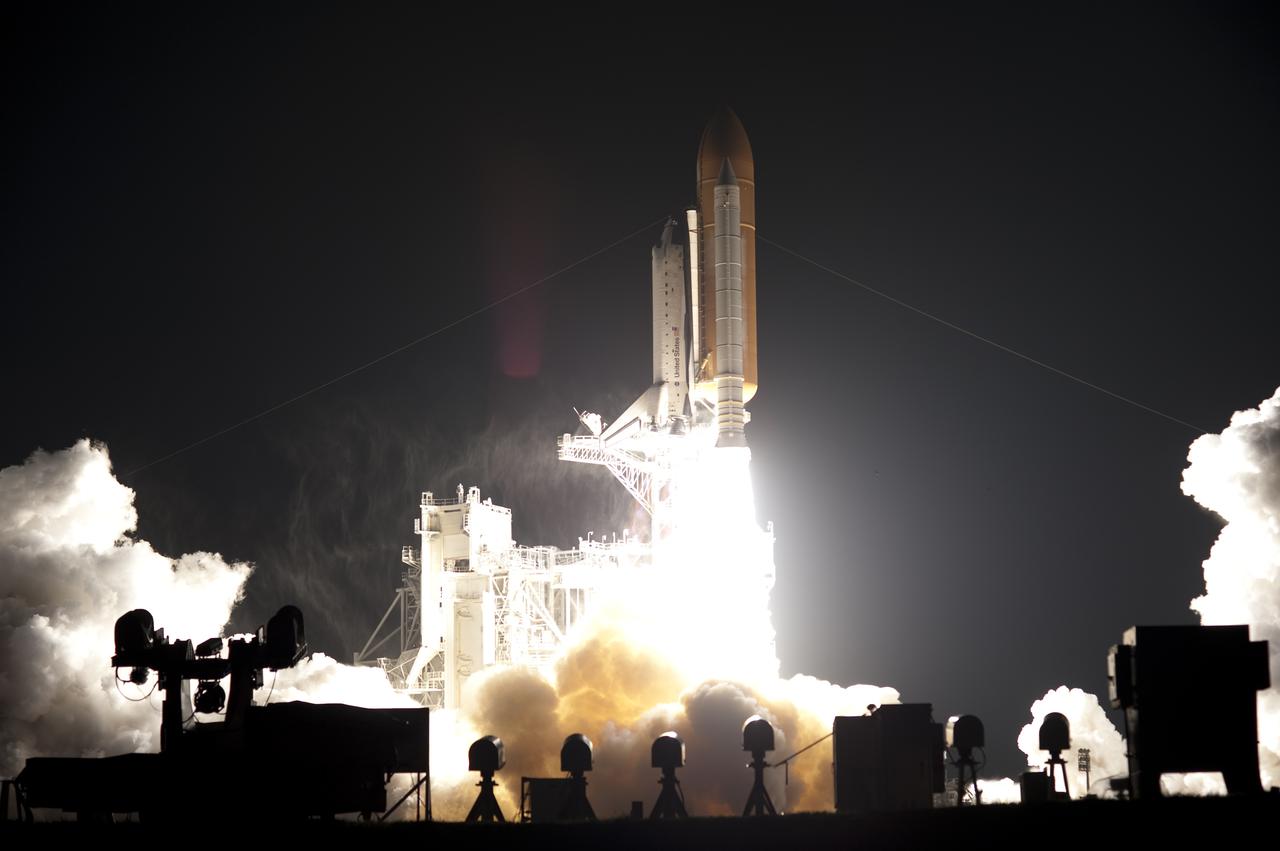 CAPE CANAVERAL, Fla. - Cameras track space shuttle Endeavour as it races into the night sky from Launch Pad 39A at NASA's Kennedy Space Center in Florida. Launch of the STS-130 mission to the International Space Station was at 4:14 a.m. EST. This was the second launch attempt for space shuttle Endeavour's STS-130 crew and the final scheduled space shuttle night launch. The first attempt on Feb. 7 was scrubbed due to unfavorable weather. The primary payload for the STS-130 mission to the International Space Station is the Tranquility node, a pressurized module that will provide additional room for crew members and many of the station's life support and environmental control systems. Attached to one end of Tranquility is a cupola, a unique work area with six windows on its sides and one on top. The cupola resembles a circular bay window and will provide a vastly improved view of the station's exterior. The multi-directional view will allow the crew to monitor spacewalks and docking operations, as well as provide a spectacular view of Earth and other celestial objects. The module was built in Turin, Italy, by Thales Alenia Space for the European Space Agency. For information on the STS-130 mission and crew, visit http:__www.nasa.gov_mission_pages_shuttle_shuttlemissions_sts130_index.html. Photo credit: NASA_Tony Gray and Tom Farrar Sr.